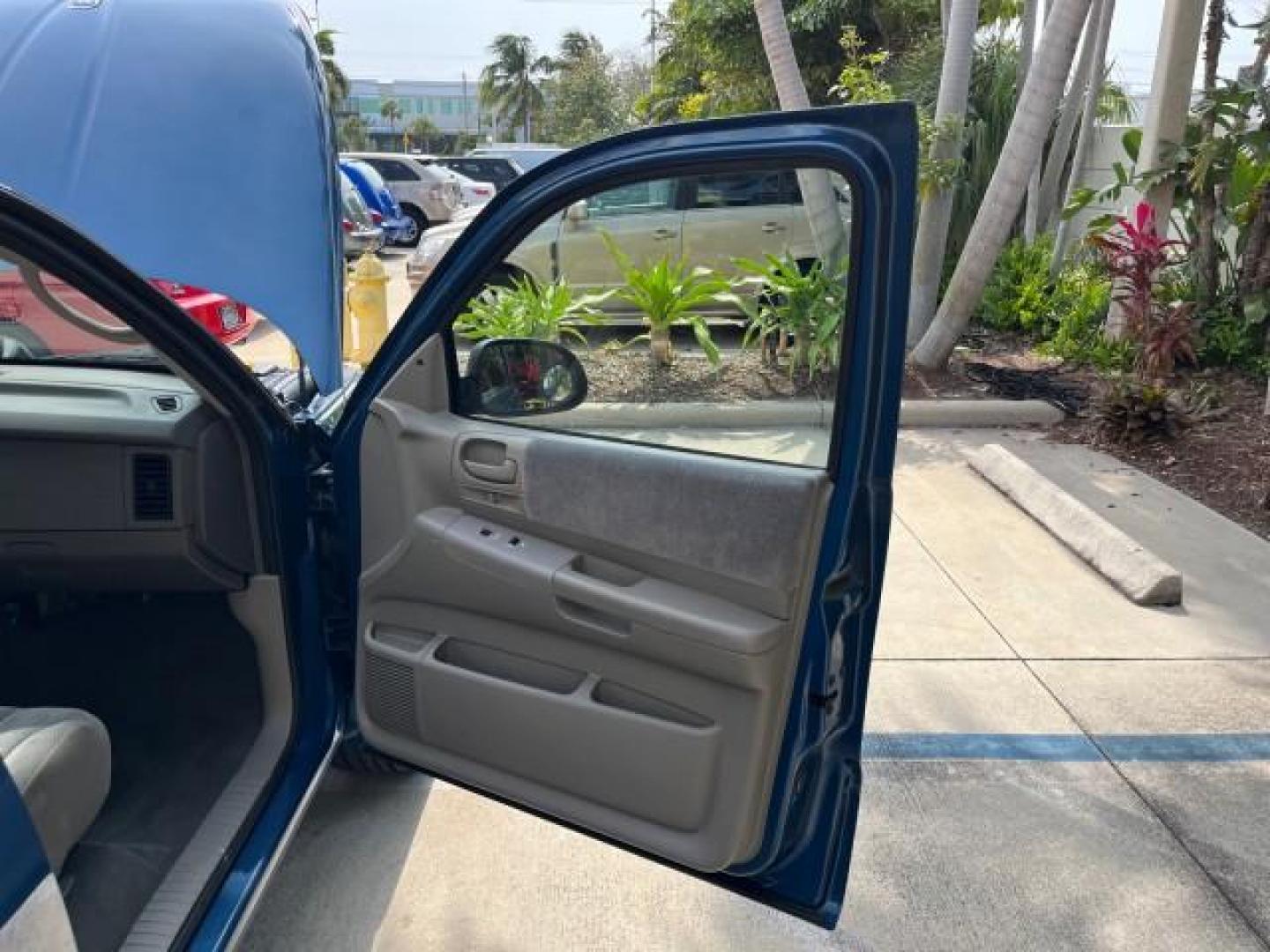 2003 Atlantic Blue Pearl /Dark Slate Gray Dodge Dakota SLT V8 LOW MILES 59,433 (1D7HL48N03S) with an 4.7L SOHC SMPI V8 Magnum Engine engine, Automatic transmission, located at 4701 North Dixie Hwy, Pompano Beach, FL, 33064, (954) 422-2889, 26.240938, -80.123474 - 2003 DODGE DAKOTA SLT ROAD READY 4.7L V8 VIN: 1D7HL48N03S351880 NO ACCIDENTS NO RECALLS CREW PICKUP LOW MILES 59,433 4.7L V8 F OHV 5.3 FT BED GASOLINE 6 SERVICE RECORDS REAR WHEEL DRIVE BACK UP CAMERA 5.3' Bed Length Alloy Wheels Approach Lights RWD THIS IS ONE OF THE NICEST DODGE S WE HAVE EVER LIS - Photo#11