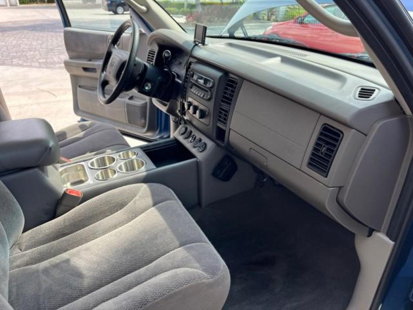 2003 Atlantic Blue Pearl /Dark Slate Gray Dodge Dakota SLT V8 LOW MILES 59,433 (1D7HL48N03S) with an 4.7L SOHC SMPI V8 Magnum Engine engine, Automatic transmission, located at 4701 North Dixie Hwy, Pompano Beach, FL, 33064, (954) 422-2889, 26.240938, -80.123474 - 2003 DODGE DAKOTA SLT ROAD READY 4.7L V8 VIN: 1D7HL48N03S351880 NO ACCIDENTS NO RECALLS CREW PICKUP LOW MILES 59,433 4.7L V8 F OHV 5.3 FT BED GASOLINE 6 SERVICE RECORDS REAR WHEEL DRIVE BACK UP CAMERA 5.3' Bed Length Alloy Wheels Approach Lights RWD THIS IS ONE OF THE NICEST DODGE S WE HAVE EVER LIS - Photo#27