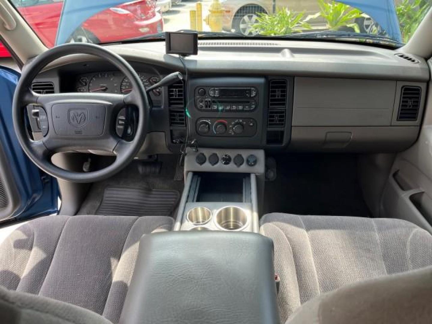 2003 Atlantic Blue Pearl /Dark Slate Gray Dodge Dakota SLT V8 LOW MILES 59,433 (1D7HL48N03S) with an 4.7L SOHC SMPI V8 Magnum Engine engine, Automatic transmission, located at 4701 North Dixie Hwy, Pompano Beach, FL, 33064, (954) 422-2889, 26.240938, -80.123474 - 2003 DODGE DAKOTA SLT ROAD READY 4.7L V8 VIN: 1D7HL48N03S351880 NO ACCIDENTS NO RECALLS CREW PICKUP LOW MILES 59,433 4.7L V8 F OHV 5.3 FT BED GASOLINE 6 SERVICE RECORDS REAR WHEEL DRIVE BACK UP CAMERA 5.3' Bed Length Alloy Wheels Approach Lights RWD THIS IS ONE OF THE NICEST DODGE S WE HAVE EVER LIS - Photo#35