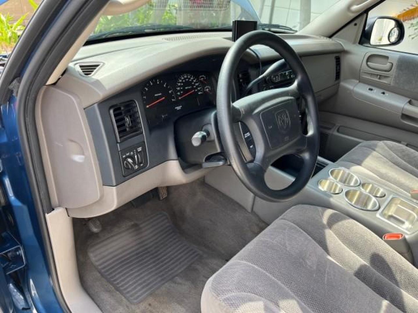 2003 Atlantic Blue Pearl /Dark Slate Gray Dodge Dakota SLT V8 LOW MILES 59,433 (1D7HL48N03S) with an 4.7L SOHC SMPI V8 Magnum Engine engine, Automatic transmission, located at 4701 North Dixie Hwy, Pompano Beach, FL, 33064, (954) 422-2889, 26.240938, -80.123474 - 2003 DODGE DAKOTA SLT ROAD READY 4.7L V8 VIN: 1D7HL48N03S351880 NO ACCIDENTS NO RECALLS CREW PICKUP LOW MILES 59,433 4.7L V8 F OHV 5.3 FT BED GASOLINE 6 SERVICE RECORDS REAR WHEEL DRIVE BACK UP CAMERA 5.3' Bed Length Alloy Wheels Approach Lights RWD THIS IS ONE OF THE NICEST DODGE S WE HAVE EVER LIS - Photo#43