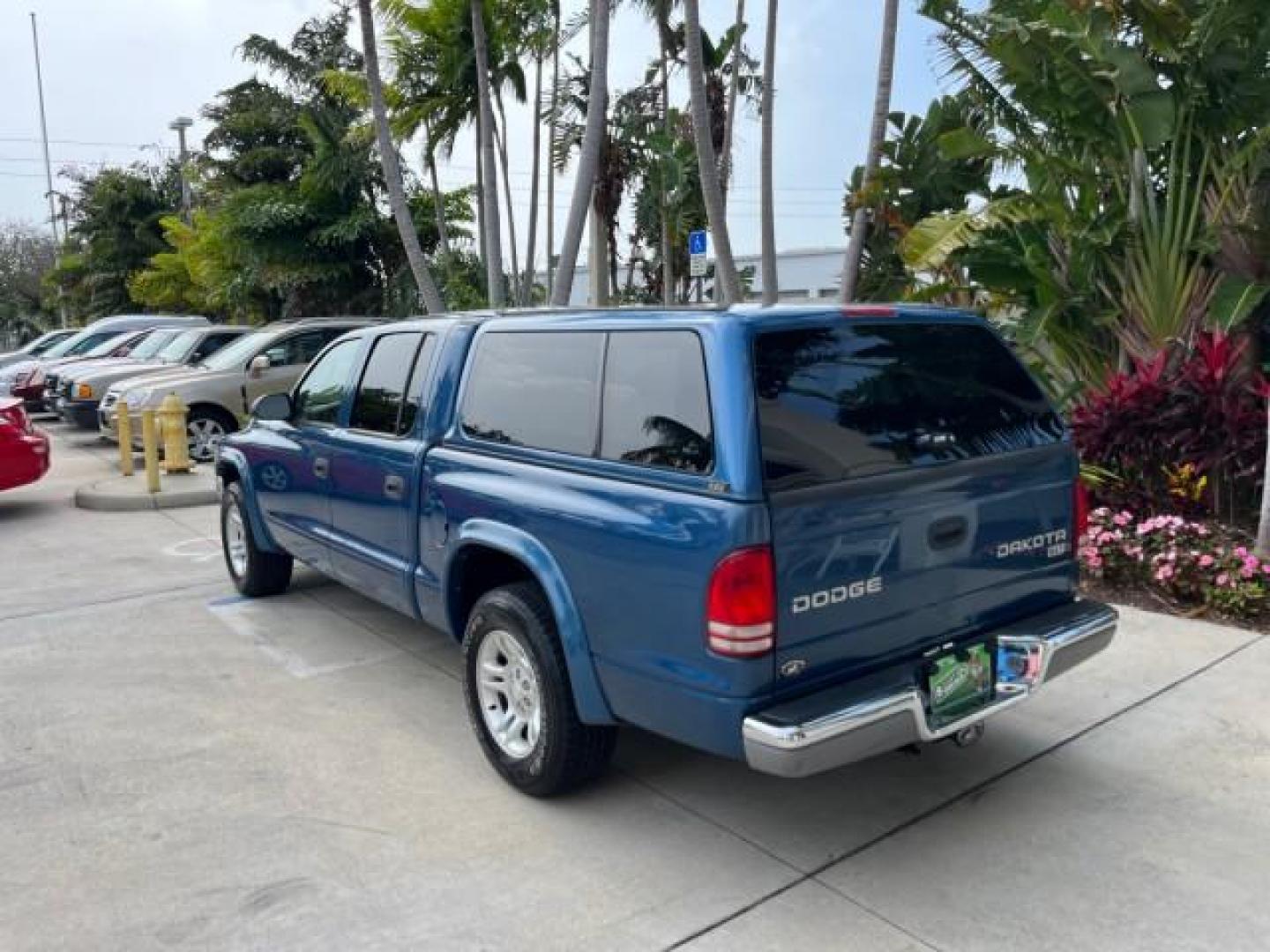 2003 Atlantic Blue Pearl /Dark Slate Gray Dodge Dakota SLT V8 LOW MILES 59,433 (1D7HL48N03S) with an 4.7L SOHC SMPI V8 Magnum Engine engine, Automatic transmission, located at 4701 North Dixie Hwy, Pompano Beach, FL, 33064, (954) 422-2889, 26.240938, -80.123474 - 2003 DODGE DAKOTA SLT ROAD READY 4.7L V8 VIN: 1D7HL48N03S351880 NO ACCIDENTS NO RECALLS CREW PICKUP LOW MILES 59,433 4.7L V8 F OHV 5.3 FT BED GASOLINE 6 SERVICE RECORDS REAR WHEEL DRIVE BACK UP CAMERA 5.3' Bed Length Alloy Wheels Approach Lights RWD THIS IS ONE OF THE NICEST DODGE S WE HAVE EVER LIS - Photo#5