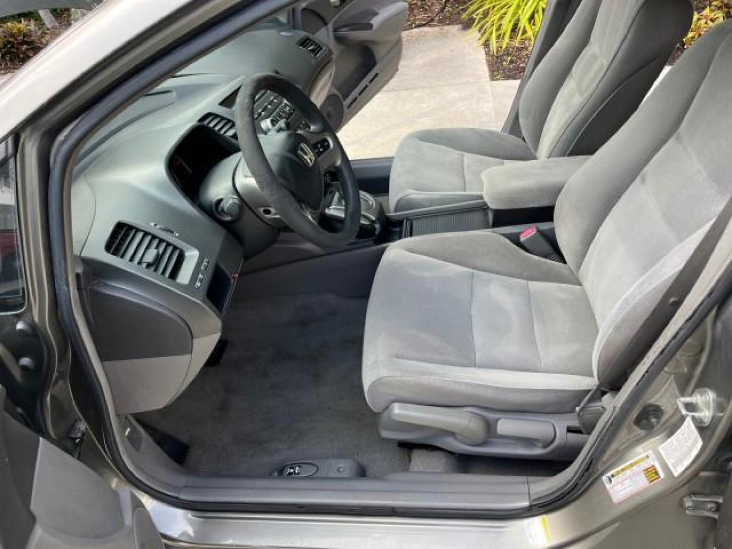 2007 Galaxy Gray Metallic /Gray Honda Civic Sdn EX LOW MILES 52,219 (1HGFA16867L) with an 1.8L SOHC MPFI 16-Valve i-VTEC I4 Engine engine, Automatic transmission, located at 4701 North Dixie Hwy, Pompano Beach, FL, 33064, (954) 422-2889, 26.240938, -80.123474 - OUR WEBPAGE FLORIDACARS1.COM HAS OVER 100 PHOTOS AND FREE CARFAX LINK 2007 HONDA CIVIC EX ROAD READY 1.8L I4 VIN: 1HGFA16867L141952 NO ACCIDENTS NO RECALLS SEDAN 4 DR FLORIDA OWNER 40 MPG 1.8L I4 F SOHC 16V POWER SUNROOF GASOLINE LOW MILES 52,219 FRONT WHEEL DRIVE 20 SERVICE RECORDS Alloy Wheels Ant - Photo#10