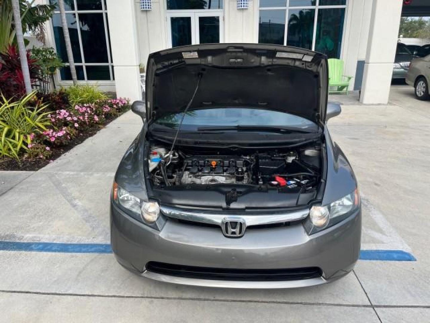 2007 Galaxy Gray Metallic /Gray Honda Civic Sdn EX LOW MILES 52,219 (1HGFA16867L) with an 1.8L SOHC MPFI 16-Valve i-VTEC I4 Engine engine, Automatic transmission, located at 4701 North Dixie Hwy, Pompano Beach, FL, 33064, (954) 422-2889, 26.240938, -80.123474 - OUR WEBPAGE FLORIDACARS1.COM HAS OVER 100 PHOTOS AND FREE CARFAX LINK 2007 HONDA CIVIC EX ROAD READY 1.8L I4 VIN: 1HGFA16867L141952 NO ACCIDENTS NO RECALLS SEDAN 4 DR FLORIDA OWNER 40 MPG 1.8L I4 F SOHC 16V POWER SUNROOF GASOLINE LOW MILES 52,219 FRONT WHEEL DRIVE 20 SERVICE RECORDS Alloy Wheels Ant - Photo#61