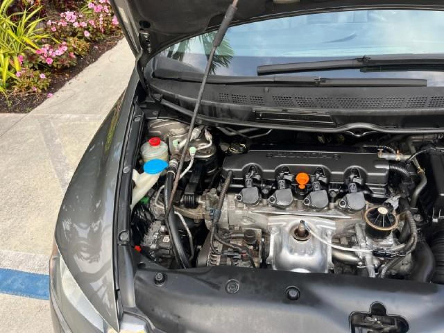 2007 Galaxy Gray Metallic /Gray Honda Civic Sdn EX LOW MILES 52,219 (1HGFA16867L) with an 1.8L SOHC MPFI 16-Valve i-VTEC I4 Engine engine, Automatic transmission, located at 4701 North Dixie Hwy, Pompano Beach, FL, 33064, (954) 422-2889, 26.240938, -80.123474 - OUR WEBPAGE FLORIDACARS1.COM HAS OVER 100 PHOTOS AND FREE CARFAX LINK 2007 HONDA CIVIC EX ROAD READY 1.8L I4 VIN: 1HGFA16867L141952 NO ACCIDENTS NO RECALLS SEDAN 4 DR FLORIDA OWNER 40 MPG 1.8L I4 F SOHC 16V POWER SUNROOF GASOLINE LOW MILES 52,219 FRONT WHEEL DRIVE 20 SERVICE RECORDS Alloy Wheels Ant - Photo#63