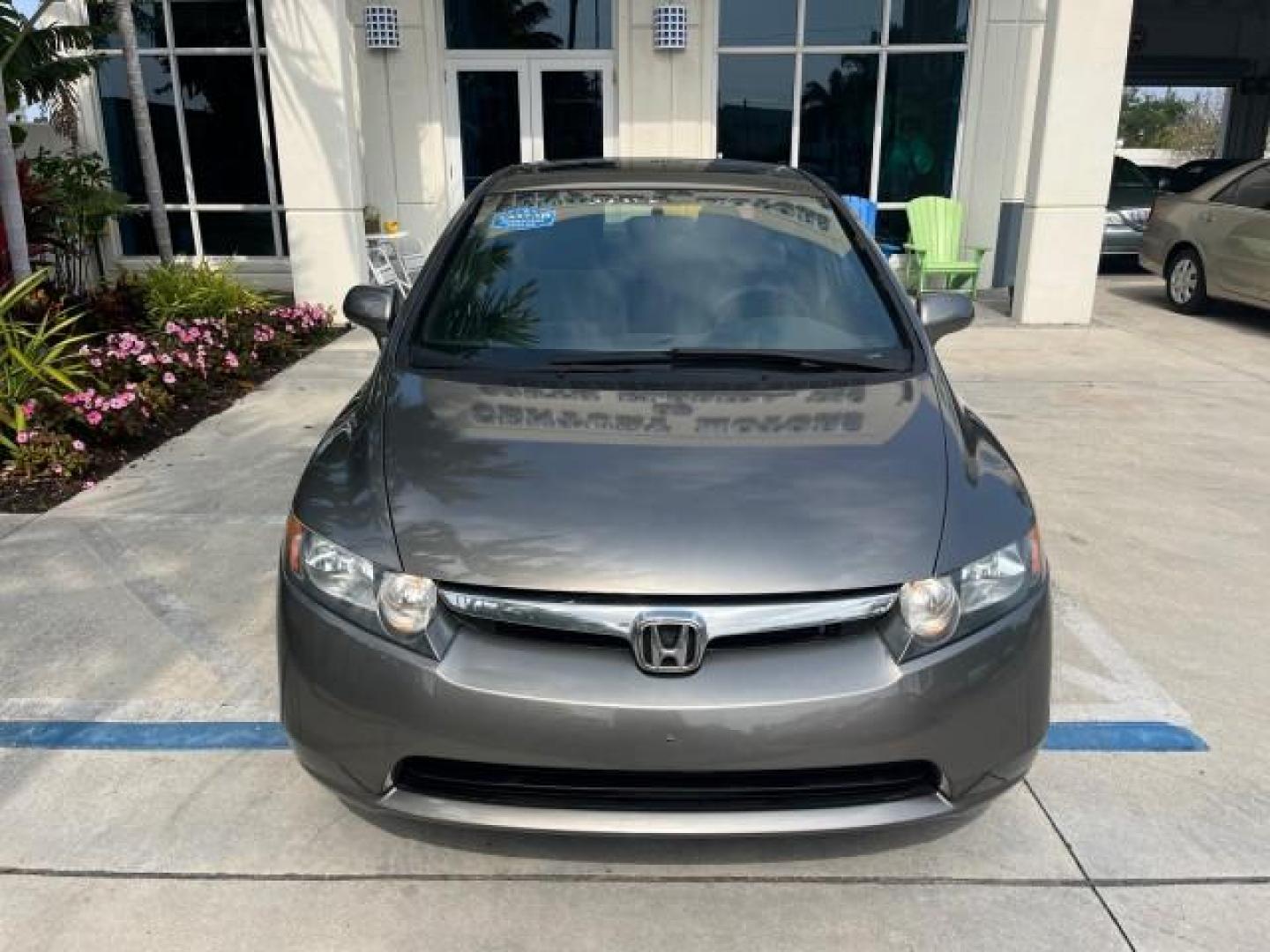 2007 Galaxy Gray Metallic /Gray Honda Civic Sdn EX LOW MILES 52,219 (1HGFA16867L) with an 1.8L SOHC MPFI 16-Valve i-VTEC I4 Engine engine, Automatic transmission, located at 4701 North Dixie Hwy, Pompano Beach, FL, 33064, (954) 422-2889, 26.240938, -80.123474 - OUR WEBPAGE FLORIDACARS1.COM HAS OVER 100 PHOTOS AND FREE CARFAX LINK 2007 HONDA CIVIC EX ROAD READY 1.8L I4 VIN: 1HGFA16867L141952 NO ACCIDENTS NO RECALLS SEDAN 4 DR FLORIDA OWNER 40 MPG 1.8L I4 F SOHC 16V POWER SUNROOF GASOLINE LOW MILES 52,219 FRONT WHEEL DRIVE 20 SERVICE RECORDS Alloy Wheels Ant - Photo#65