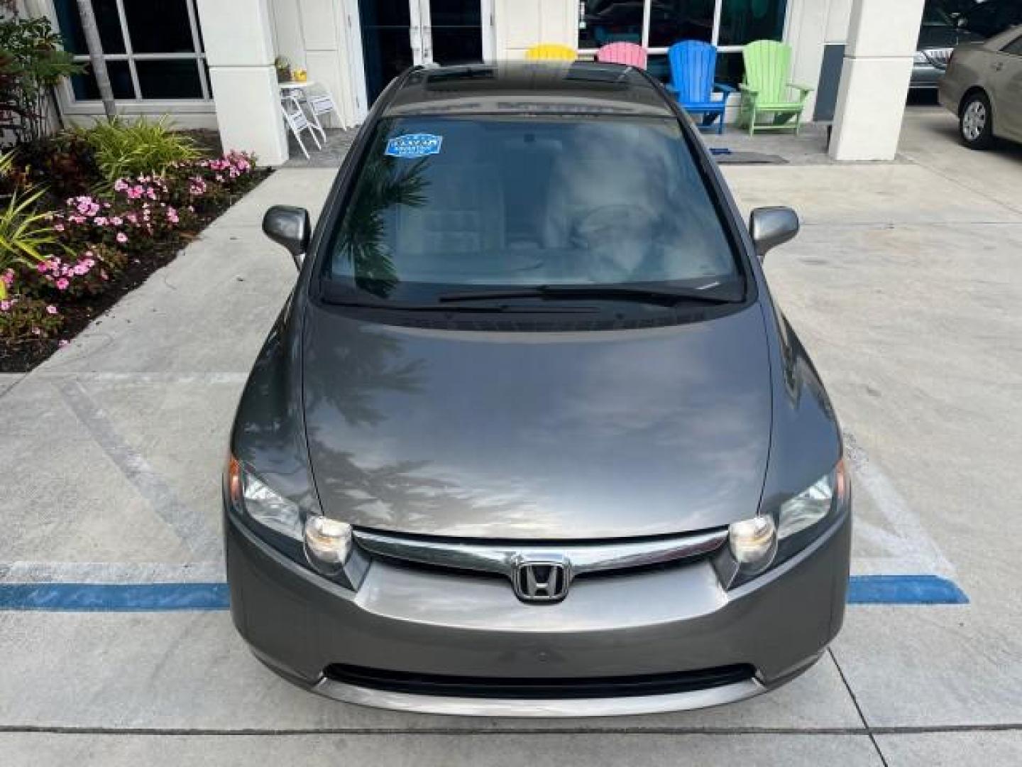 2007 Galaxy Gray Metallic /Gray Honda Civic Sdn EX LOW MILES 52,219 (1HGFA16867L) with an 1.8L SOHC MPFI 16-Valve i-VTEC I4 Engine engine, Automatic transmission, located at 4701 North Dixie Hwy, Pompano Beach, FL, 33064, (954) 422-2889, 26.240938, -80.123474 - OUR WEBPAGE FLORIDACARS1.COM HAS OVER 100 PHOTOS AND FREE CARFAX LINK 2007 HONDA CIVIC EX ROAD READY 1.8L I4 VIN: 1HGFA16867L141952 NO ACCIDENTS NO RECALLS SEDAN 4 DR FLORIDA OWNER 40 MPG 1.8L I4 F SOHC 16V POWER SUNROOF GASOLINE LOW MILES 52,219 FRONT WHEEL DRIVE 20 SERVICE RECORDS Alloy Wheels Ant - Photo#74