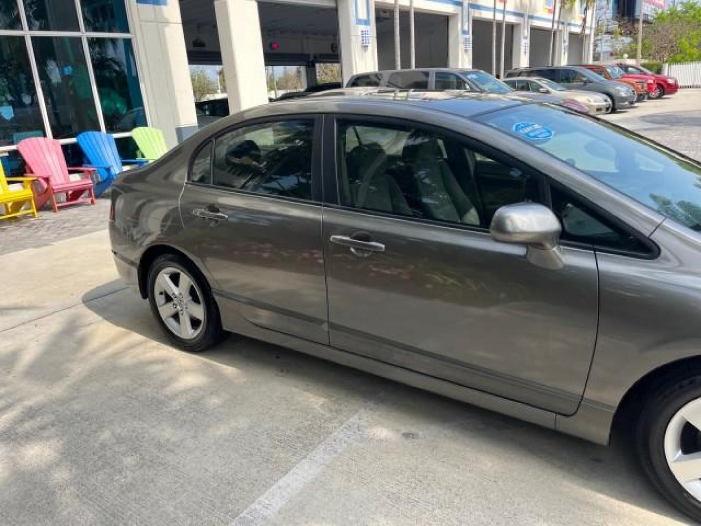 2007 Galaxy Gray Metallic /Gray Honda Civic Sdn EX LOW MILES 52,219 (1HGFA16867L) with an 1.8L SOHC MPFI 16-Valve i-VTEC I4 Engine engine, Automatic transmission, located at 4701 North Dixie Hwy, Pompano Beach, FL, 33064, (954) 422-2889, 26.240938, -80.123474 - OUR WEBPAGE FLORIDACARS1.COM HAS OVER 100 PHOTOS AND FREE CARFAX LINK 2007 HONDA CIVIC EX ROAD READY 1.8L I4 VIN: 1HGFA16867L141952 NO ACCIDENTS NO RECALLS SEDAN 4 DR FLORIDA OWNER 40 MPG 1.8L I4 F SOHC 16V POWER SUNROOF GASOLINE LOW MILES 52,219 FRONT WHEEL DRIVE 20 SERVICE RECORDS Alloy Wheels Ant - Photo#78