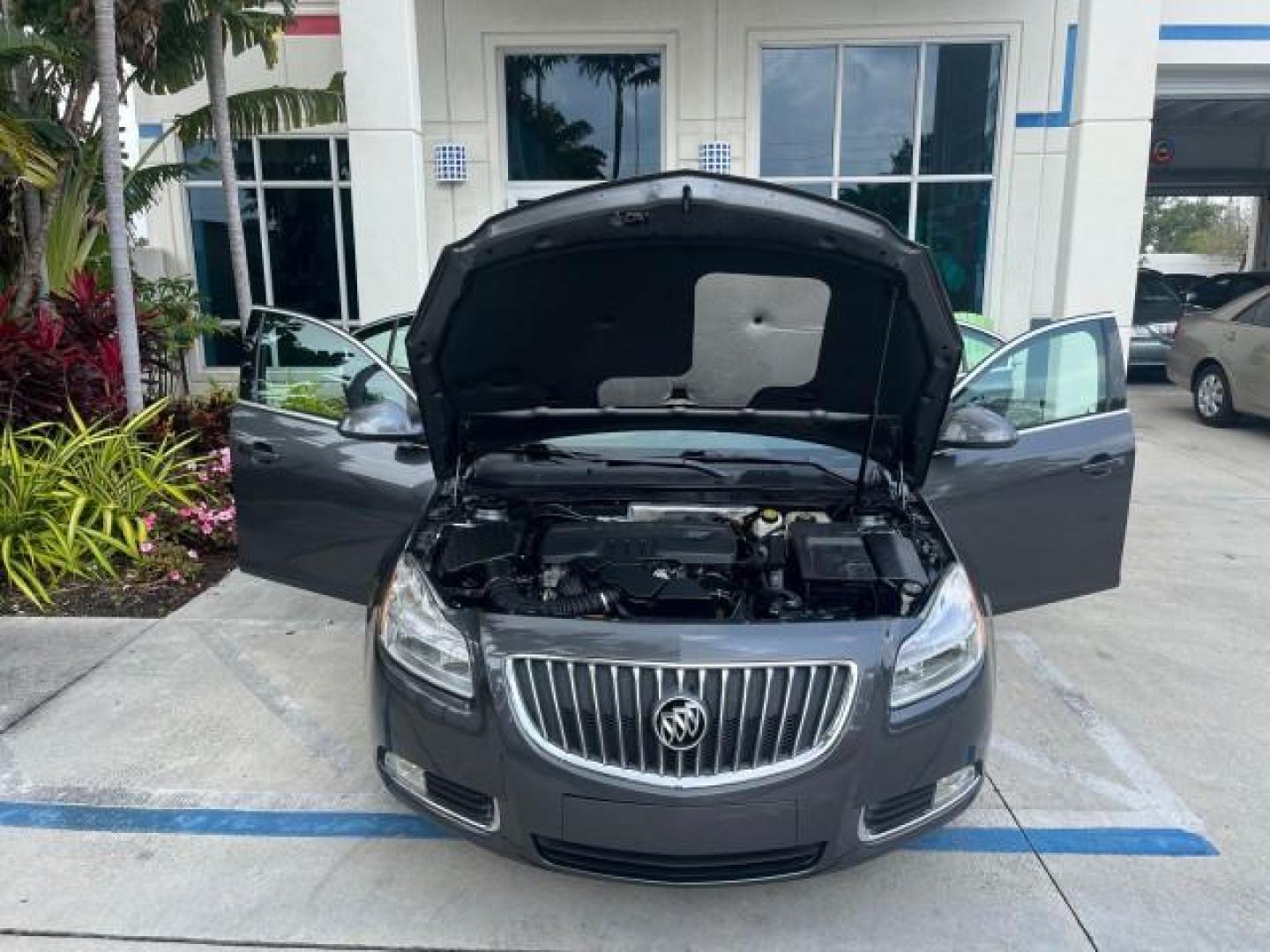 2011 Granite Gray Metallic /Ebony Buick Regal CXL RL1 LOW MILES 46,789 (W04GN5EC2B1) with an 2.4L Ecotec DOHC 4-Cyl SIDI Spark Ignition DI Engine engine, Automatic transmission, located at 4701 North Dixie Hwy, Pompano Beach, FL, 33064, (954) 422-2889, 26.240938, -80.123474 - OUR WEBPAGE FLORIDACARS1.COM HAS OVER 100 PHOTOS AND FREE CARFAX LINK 2011 BUICK REGAL CXL ROAD READY 2.4L I4 VIN: W04GN5EC2B1107946 NO ACCIDENTS NO RECALLS SEDAN 4 DR FLORIDA OWNER 30 MPG 2.4L I4 F DOHC 16V BLUETOOTH GASOLINE POWER LEATHER SEATS FRONT WHEEL DRIVE LOW MILES 46,789 23 SERVICE RECORDS - Photo#16