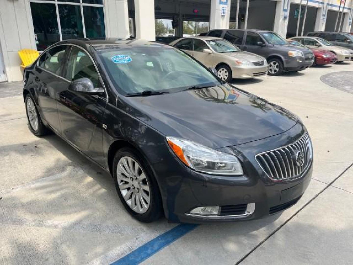 2011 Granite Gray Metallic /Ebony Buick Regal CXL RL1 LOW MILES 46,789 (W04GN5EC2B1) with an 2.4L Ecotec DOHC 4-Cyl SIDI Spark Ignition DI Engine engine, Automatic transmission, located at 4701 North Dixie Hwy, Pompano Beach, FL, 33064, (954) 422-2889, 26.240938, -80.123474 - OUR WEBPAGE FLORIDACARS1.COM HAS OVER 100 PHOTOS AND FREE CARFAX LINK 2011 BUICK REGAL CXL ROAD READY 2.4L I4 VIN: W04GN5EC2B1107946 NO ACCIDENTS NO RECALLS SEDAN 4 DR FLORIDA OWNER 30 MPG 2.4L I4 F DOHC 16V BLUETOOTH GASOLINE POWER LEATHER SEATS FRONT WHEEL DRIVE LOW MILES 46,789 23 SERVICE RECORDS - Photo#77