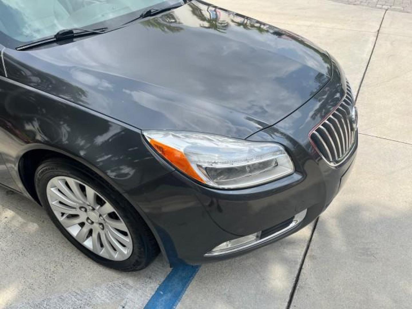 2011 Granite Gray Metallic /Ebony Buick Regal CXL RL1 LOW MILES 46,789 (W04GN5EC2B1) with an 2.4L Ecotec DOHC 4-Cyl SIDI Spark Ignition DI Engine engine, Automatic transmission, located at 4701 North Dixie Hwy, Pompano Beach, FL, 33064, (954) 422-2889, 26.240938, -80.123474 - OUR WEBPAGE FLORIDACARS1.COM HAS OVER 100 PHOTOS AND FREE CARFAX LINK 2011 BUICK REGAL CXL ROAD READY 2.4L I4 VIN: W04GN5EC2B1107946 NO ACCIDENTS NO RECALLS SEDAN 4 DR FLORIDA OWNER 30 MPG 2.4L I4 F DOHC 16V BLUETOOTH GASOLINE POWER LEATHER SEATS FRONT WHEEL DRIVE LOW MILES 46,789 23 SERVICE RECORDS - Photo#86