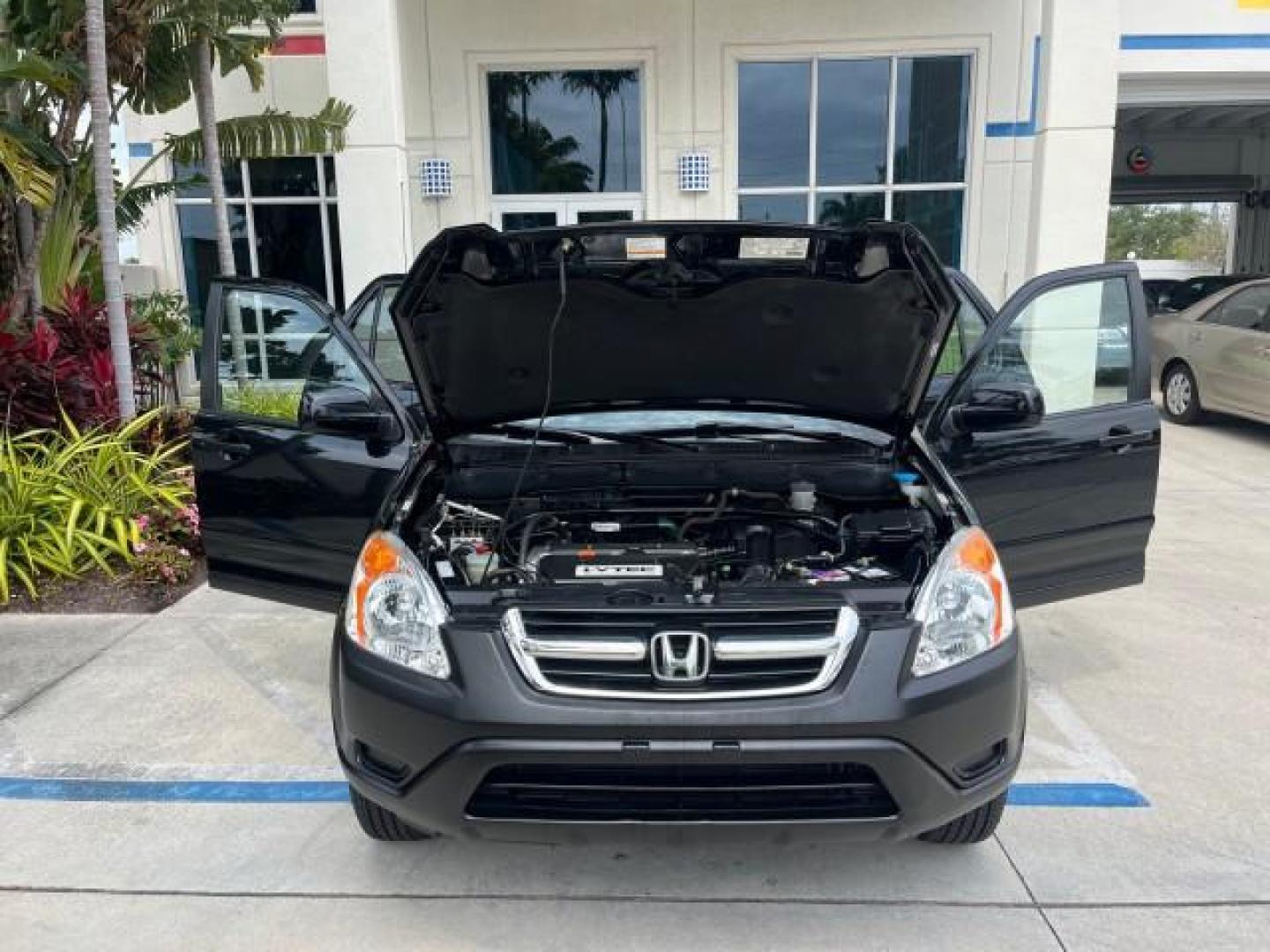 2003 Nighthawk Black Pearl /Black Honda CR-V 4X4 EX LOW MILES 73,207 (SHSRD78893U) with an 2.4L DOHC i-VTEC 16-Valve I4 Engine engine, Automatic transmission, located at 4701 North Dixie Hwy, Pompano Beach, FL, 33064, (954) 422-2889, 26.240938, -80.123474 - 2003 HONDA CR-V EX ROAD READY 2.4L I4 VIN: SHSRD78893U117766 NO ACCIDENTS 4 DOOR WAGON/SPORT UTILITY NO RECALLS 2.4L I4 F DOHC FLORIDA OWNER GASOLINE POWER SUNROOF LOW MILES 73,207 ALL WHEEL DRIVE ALL WHEEL DRIVE 17 SERVICE RECORDS AWD Alloy Wheels Approach Lights Cruise Control Front Bucket Seats M - Photo#16