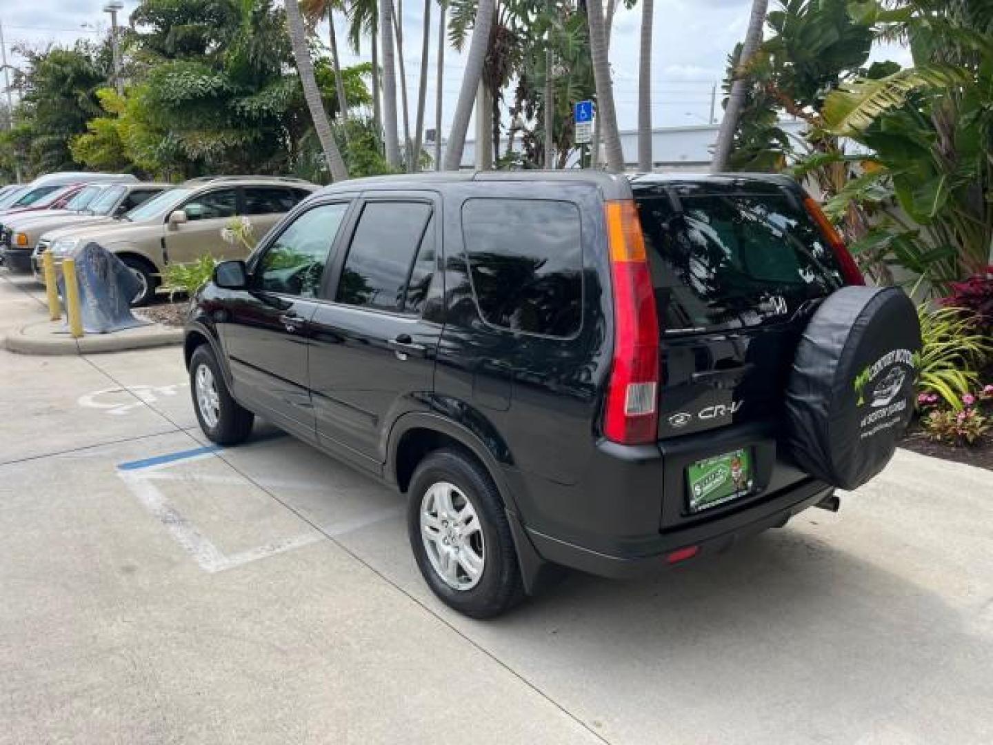 2003 Nighthawk Black Pearl /Black Honda CR-V 4X4 EX LOW MILES 73,207 (SHSRD78893U) with an 2.4L DOHC i-VTEC 16-Valve I4 Engine engine, Automatic transmission, located at 4701 North Dixie Hwy, Pompano Beach, FL, 33064, (954) 422-2889, 26.240938, -80.123474 - 2003 HONDA CR-V EX ROAD READY 2.4L I4 VIN: SHSRD78893U117766 NO ACCIDENTS 4 DOOR WAGON/SPORT UTILITY NO RECALLS 2.4L I4 F DOHC FLORIDA OWNER GASOLINE POWER SUNROOF LOW MILES 73,207 ALL WHEEL DRIVE ALL WHEEL DRIVE 17 SERVICE RECORDS AWD Alloy Wheels Approach Lights Cruise Control Front Bucket Seats M - Photo#5