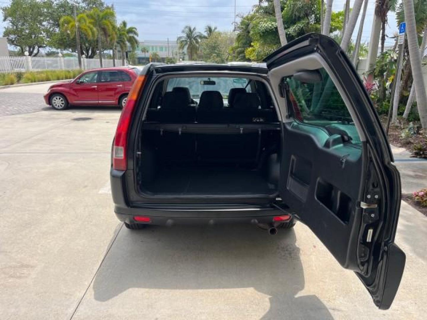 2003 Nighthawk Black Pearl /Black Honda CR-V 4X4 EX LOW MILES 73,207 (SHSRD78893U) with an 2.4L DOHC i-VTEC 16-Valve I4 Engine engine, Automatic transmission, located at 4701 North Dixie Hwy, Pompano Beach, FL, 33064, (954) 422-2889, 26.240938, -80.123474 - 2003 HONDA CR-V EX ROAD READY 2.4L I4 VIN: SHSRD78893U117766 NO ACCIDENTS 4 DOOR WAGON/SPORT UTILITY NO RECALLS 2.4L I4 F DOHC FLORIDA OWNER GASOLINE POWER SUNROOF LOW MILES 73,207 ALL WHEEL DRIVE ALL WHEEL DRIVE 17 SERVICE RECORDS AWD Alloy Wheels Approach Lights Cruise Control Front Bucket Seats M - Photo#61