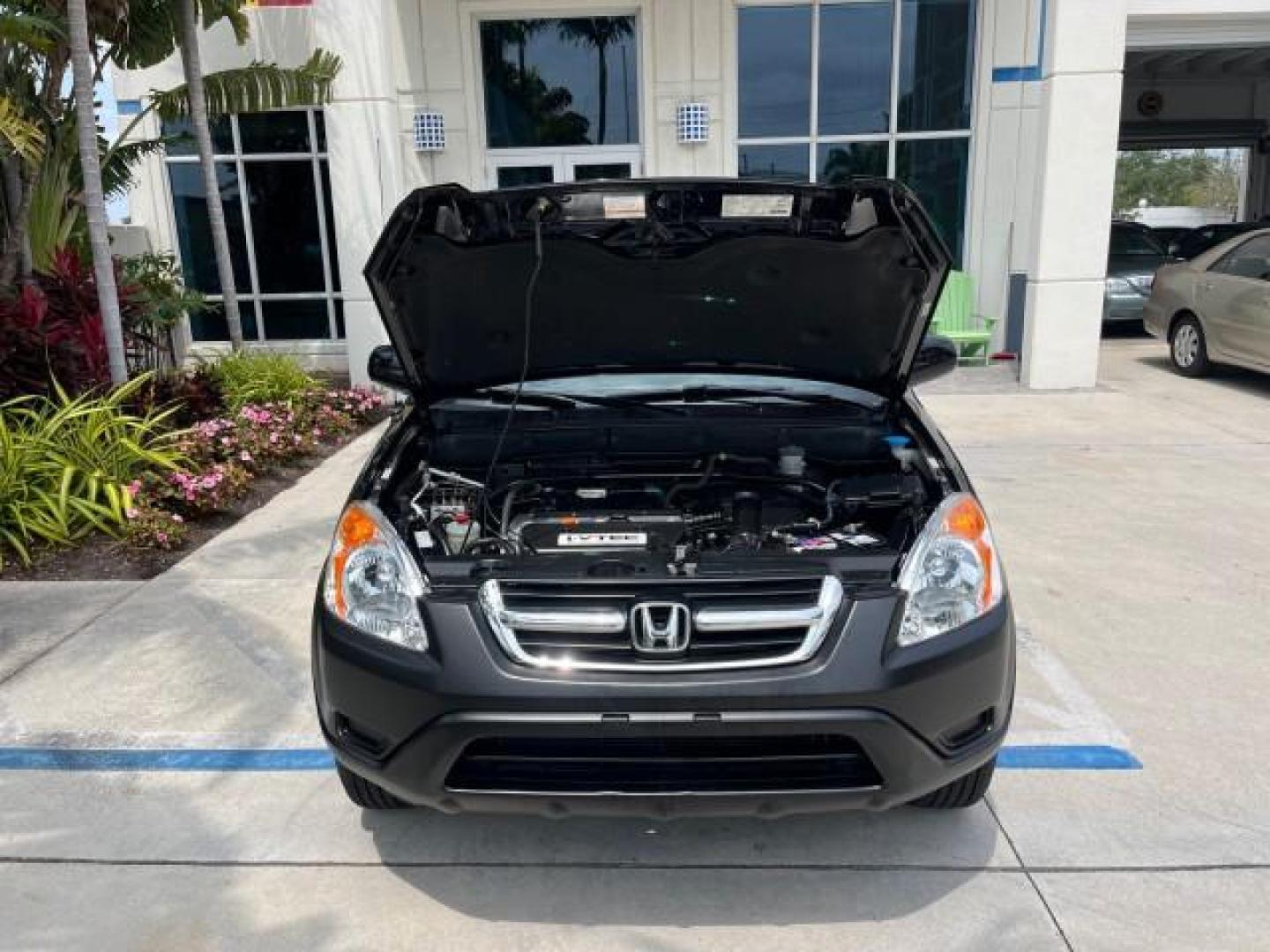 2003 Nighthawk Black Pearl /Black Honda CR-V 4X4 EX LOW MILES 73,207 (SHSRD78893U) with an 2.4L DOHC i-VTEC 16-Valve I4 Engine engine, Automatic transmission, located at 4701 North Dixie Hwy, Pompano Beach, FL, 33064, (954) 422-2889, 26.240938, -80.123474 - 2003 HONDA CR-V EX ROAD READY 2.4L I4 VIN: SHSRD78893U117766 NO ACCIDENTS 4 DOOR WAGON/SPORT UTILITY NO RECALLS 2.4L I4 F DOHC FLORIDA OWNER GASOLINE POWER SUNROOF LOW MILES 73,207 ALL WHEEL DRIVE ALL WHEEL DRIVE 17 SERVICE RECORDS AWD Alloy Wheels Approach Lights Cruise Control Front Bucket Seats M - Photo#67