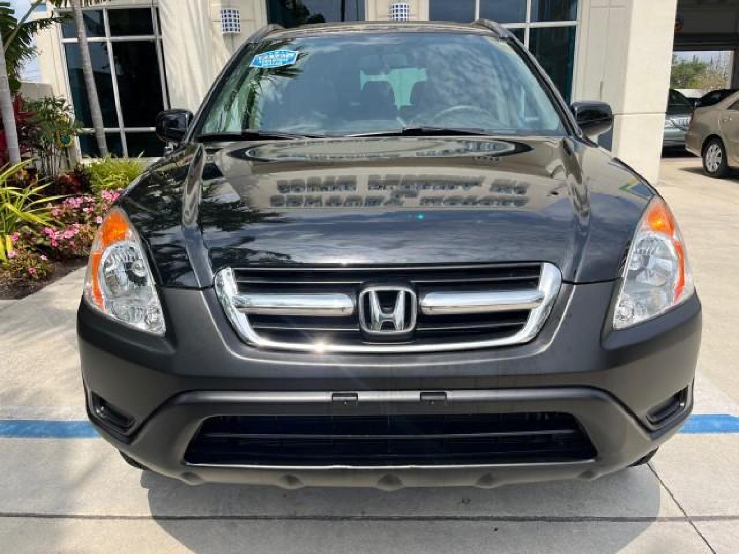 2003 Nighthawk Black Pearl /Black Honda CR-V 4X4 EX LOW MILES 73,207 (SHSRD78893U) with an 2.4L DOHC i-VTEC 16-Valve I4 Engine engine, Automatic transmission, located at 4701 North Dixie Hwy, Pompano Beach, FL, 33064, (954) 422-2889, 26.240938, -80.123474 - 2003 HONDA CR-V EX ROAD READY 2.4L I4 VIN: SHSRD78893U117766 NO ACCIDENTS 4 DOOR WAGON/SPORT UTILITY NO RECALLS 2.4L I4 F DOHC FLORIDA OWNER GASOLINE POWER SUNROOF LOW MILES 73,207 ALL WHEEL DRIVE ALL WHEEL DRIVE 17 SERVICE RECORDS AWD Alloy Wheels Approach Lights Cruise Control Front Bucket Seats M - Photo#73