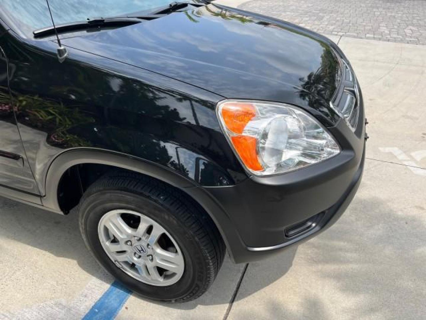 2003 Nighthawk Black Pearl /Black Honda CR-V 4X4 EX LOW MILES 73,207 (SHSRD78893U) with an 2.4L DOHC i-VTEC 16-Valve I4 Engine engine, Automatic transmission, located at 4701 North Dixie Hwy, Pompano Beach, FL, 33064, (954) 422-2889, 26.240938, -80.123474 - 2003 HONDA CR-V EX ROAD READY 2.4L I4 VIN: SHSRD78893U117766 NO ACCIDENTS 4 DOOR WAGON/SPORT UTILITY NO RECALLS 2.4L I4 F DOHC FLORIDA OWNER GASOLINE POWER SUNROOF LOW MILES 73,207 ALL WHEEL DRIVE ALL WHEEL DRIVE 17 SERVICE RECORDS AWD Alloy Wheels Approach Lights Cruise Control Front Bucket Seats M - Photo#81