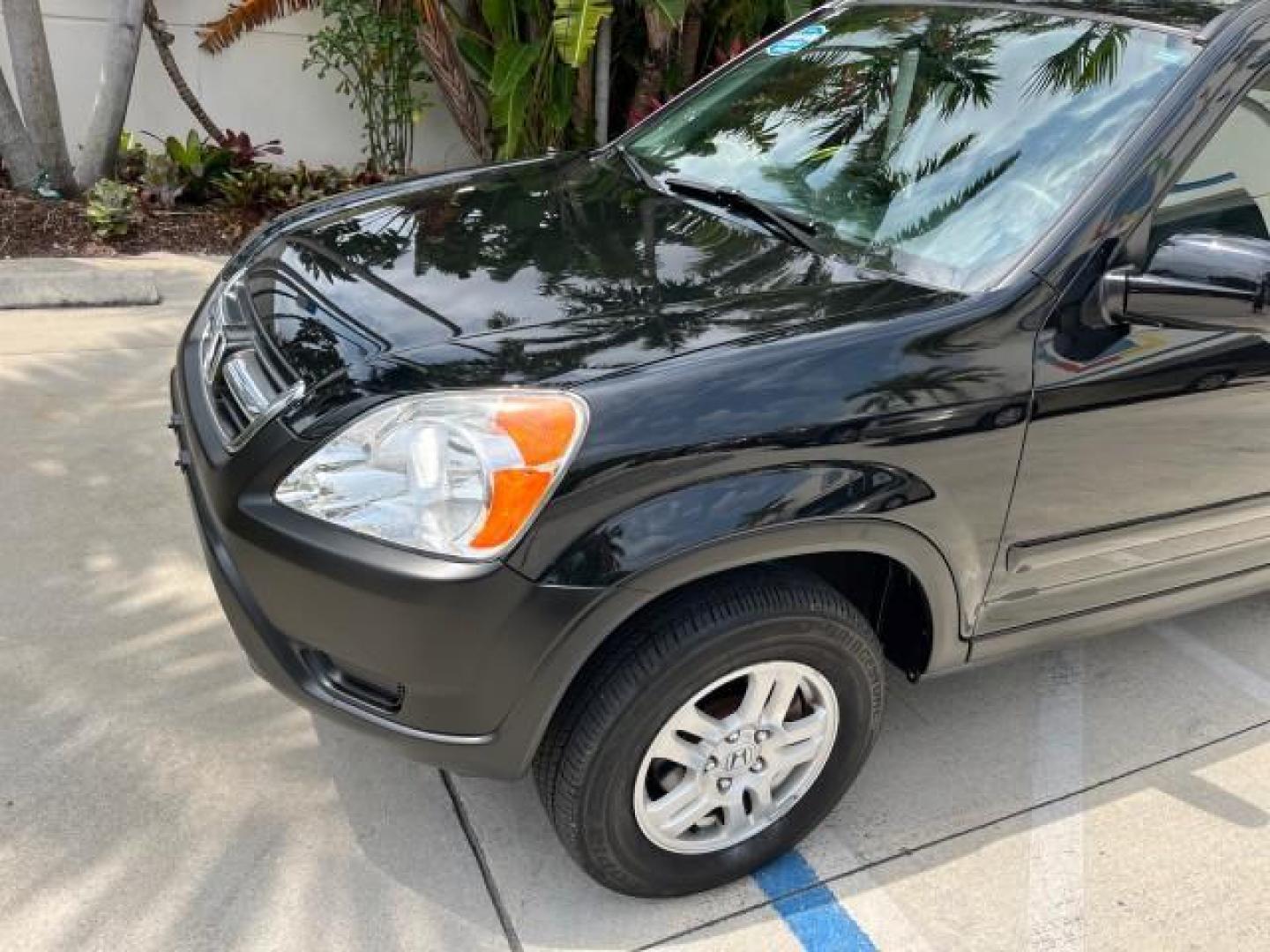 2003 Nighthawk Black Pearl /Black Honda CR-V 4X4 EX LOW MILES 73,207 (SHSRD78893U) with an 2.4L DOHC i-VTEC 16-Valve I4 Engine engine, Automatic transmission, located at 4701 North Dixie Hwy, Pompano Beach, FL, 33064, (954) 422-2889, 26.240938, -80.123474 - 2003 HONDA CR-V EX ROAD READY 2.4L I4 VIN: SHSRD78893U117766 NO ACCIDENTS 4 DOOR WAGON/SPORT UTILITY NO RECALLS 2.4L I4 F DOHC FLORIDA OWNER GASOLINE POWER SUNROOF LOW MILES 73,207 ALL WHEEL DRIVE ALL WHEEL DRIVE 17 SERVICE RECORDS AWD Alloy Wheels Approach Lights Cruise Control Front Bucket Seats M - Photo#82