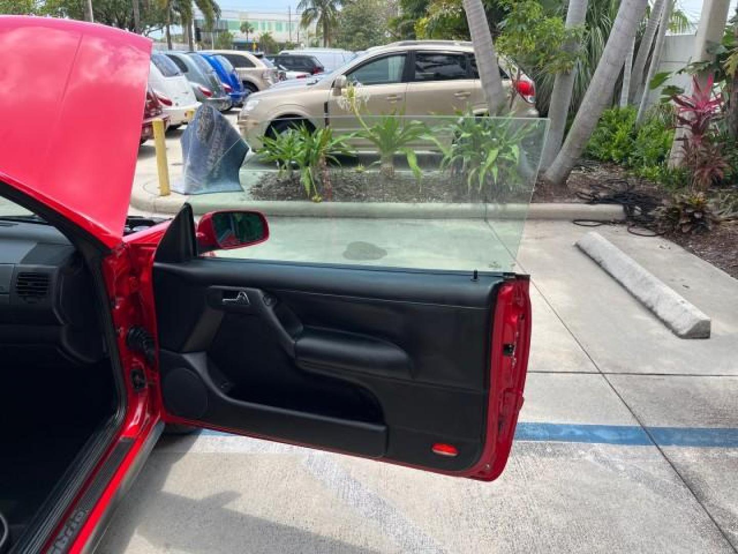 2001 Tornado Red /Black Volkswagen Cabrio GLX LOW MILES 41,566 (3VWDC21V51M) with an 2.0L SOHC SMPI 4-Cyl Engine engine, Automatic transmission, located at 4701 North Dixie Hwy, Pompano Beach, FL, 33064, (954) 422-2889, 26.240938, -80.123474 - 2001 VOLKSWAGEN CABRIO GLX ROAD READY 2.0L I4 VIN: 3VWDC21V51M816910 NO ACCIDENTS 31 MPG CONVERTIBLE CLEAN NO RECALLS 2.0L I4 F CD CHANGER FLORIDA OWNER GASOLINE HEATED LEATHER SEATS POWER CONVERTIBLE TOP FRONT WHEEL DRIVE LOW MILES 41,566 20 SERVICE RECORDS Alloy Wheels Anti-Theft System Cruise Con - Photo#12