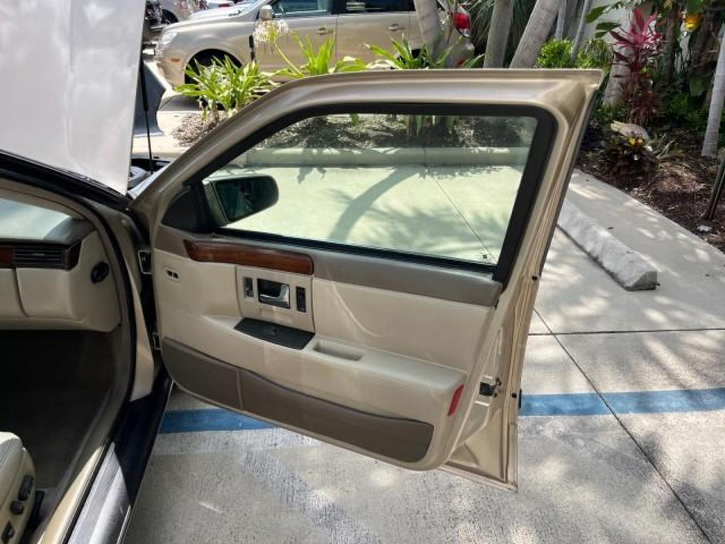 1997 Gold /Beechwood Cadillac Seville SLS LOW MILES 53,007 (1G6KS52Y5VU) with an 4.6L SPFI DOHC V8 Northstar Engine engine, Automatic transmission, located at 4701 North Dixie Hwy, Pompano Beach, FL, 33064, (954) 422-2889, 26.240938, -80.123474 - OUR WEBPAGE FLORIDACARS1.COM HAS OVER 100 PHOTOS AND FREE CARFAX LINK 1997 CADILLAC SEVILLE SLS NEW $42,105 ROAD READY VIN: 1G6KS52Y5VU802789 FLORIDA OWNER 4.6L V8 SEDAN 4 DR NO RECALLS 28 MPG 4.6L V8 F DOHC 32V POWER HEATED LEATHER SEATS GASOLINE LOW MILES 53,007 FRONT WHEEL DRIVE 14 SERVICE RECORD - Photo#11