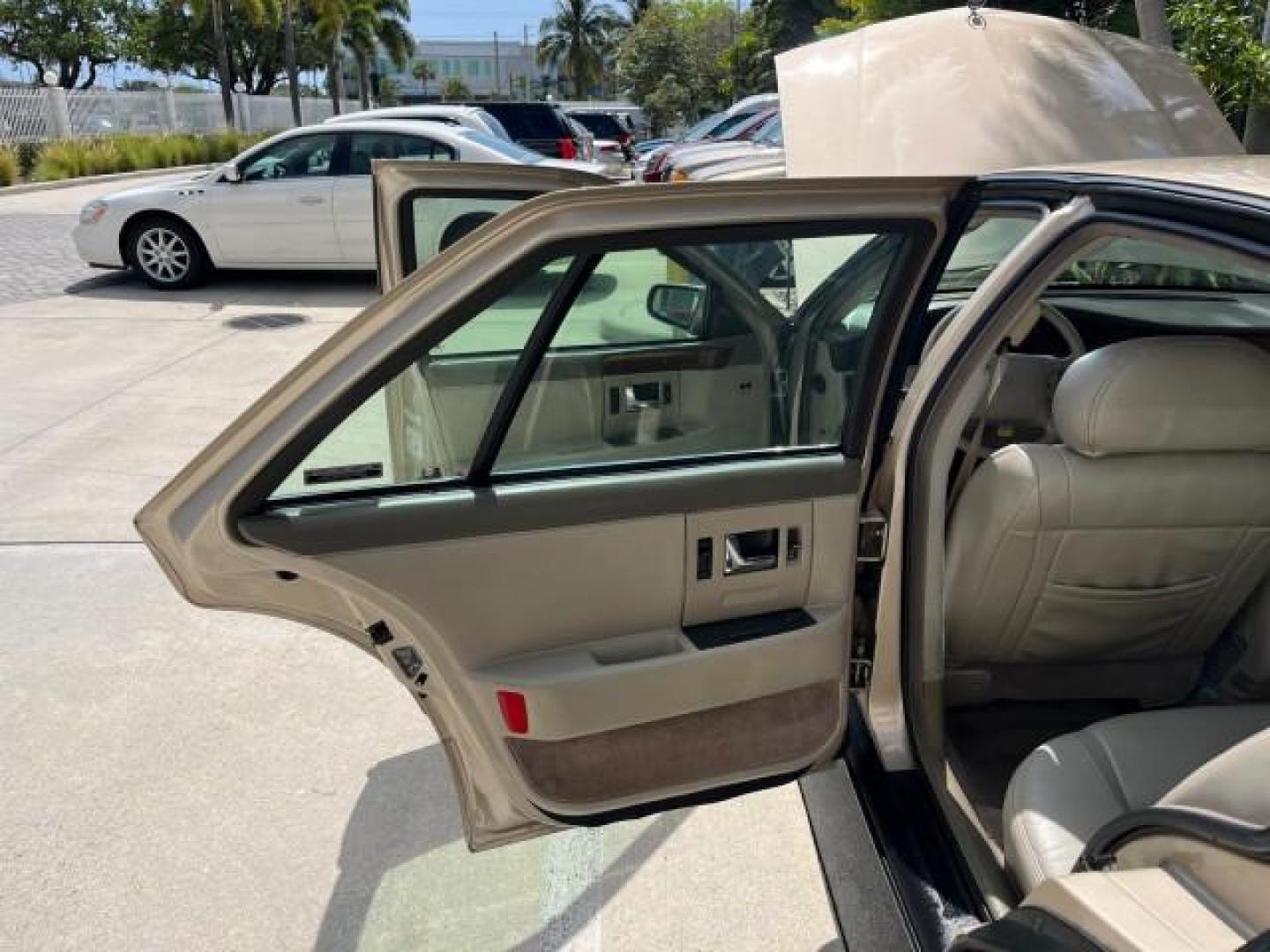 1997 Gold /Beechwood Cadillac Seville SLS LOW MILES 53,007 (1G6KS52Y5VU) with an 4.6L SPFI DOHC V8 Northstar Engine engine, Automatic transmission, located at 4701 North Dixie Hwy, Pompano Beach, FL, 33064, (954) 422-2889, 26.240938, -80.123474 - OUR WEBPAGE FLORIDACARS1.COM HAS OVER 100 PHOTOS AND FREE CARFAX LINK 1997 CADILLAC SEVILLE SLS NEW $42,105 ROAD READY VIN: 1G6KS52Y5VU802789 FLORIDA OWNER 4.6L V8 SEDAN 4 DR NO RECALLS 28 MPG 4.6L V8 F DOHC 32V POWER HEATED LEATHER SEATS GASOLINE LOW MILES 53,007 FRONT WHEEL DRIVE 14 SERVICE RECORD - Photo#13