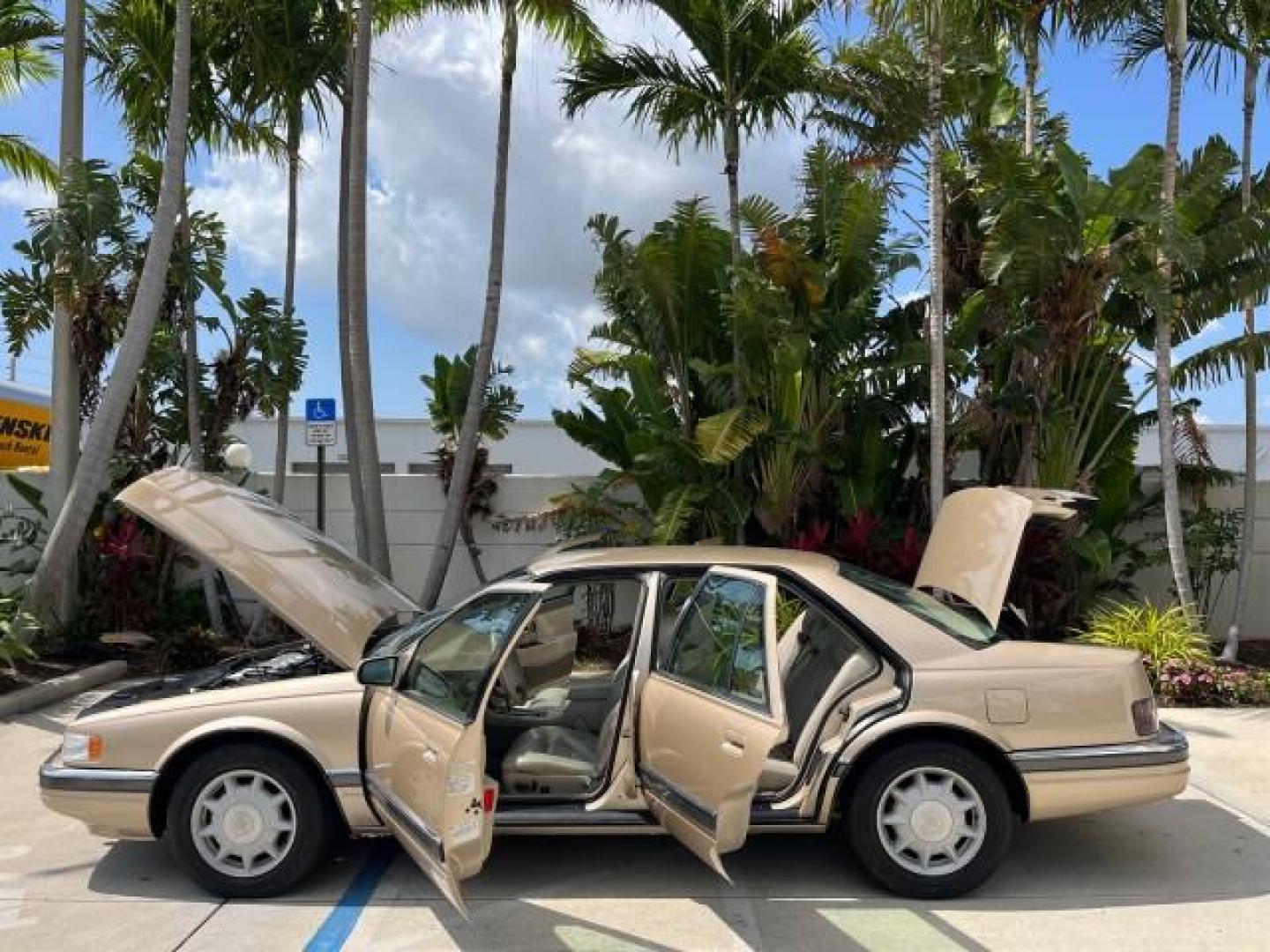 1997 Gold /Beechwood Cadillac Seville SLS LOW MILES 53,007 (1G6KS52Y5VU) with an 4.6L SPFI DOHC V8 Northstar Engine engine, Automatic transmission, located at 4701 North Dixie Hwy, Pompano Beach, FL, 33064, (954) 422-2889, 26.240938, -80.123474 - OUR WEBPAGE FLORIDACARS1.COM HAS OVER 100 PHOTOS AND FREE CARFAX LINK 1997 CADILLAC SEVILLE SLS NEW $42,105 ROAD READY VIN: 1G6KS52Y5VU802789 FLORIDA OWNER 4.6L V8 SEDAN 4 DR NO RECALLS 28 MPG 4.6L V8 F DOHC 32V POWER HEATED LEATHER SEATS GASOLINE LOW MILES 53,007 FRONT WHEEL DRIVE 14 SERVICE RECORD - Photo#8