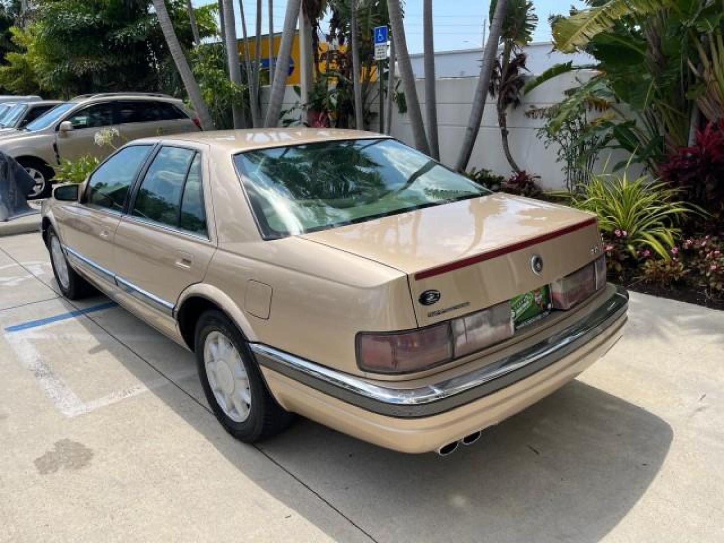 1997 Gold /Beechwood Cadillac Seville SLS LOW MILES 53,007 (1G6KS52Y5VU) with an 4.6L SPFI DOHC V8 Northstar Engine engine, Automatic transmission, located at 4701 North Dixie Hwy, Pompano Beach, FL, 33064, (954) 422-2889, 26.240938, -80.123474 - OUR WEBPAGE FLORIDACARS1.COM HAS OVER 100 PHOTOS AND FREE CARFAX LINK 1997 CADILLAC SEVILLE SLS NEW $42,105 ROAD READY VIN: 1G6KS52Y5VU802789 FLORIDA OWNER 4.6L V8 SEDAN 4 DR NO RECALLS 28 MPG 4.6L V8 F DOHC 32V POWER HEATED LEATHER SEATS GASOLINE LOW MILES 53,007 FRONT WHEEL DRIVE 14 SERVICE RECORD - Photo#90