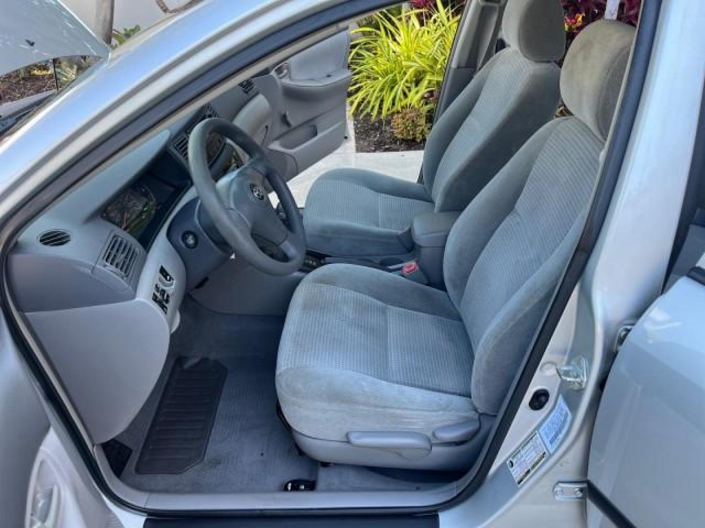 2005 Silver Streak Mica /Light Gray Toyota Corolla CE LOW MILES 39,259 (1NXBR32E55Z) with an 1.8L DOHC SEFI 16-Valve 4-Cyl Aluminum Engine engine, Automatic transmission, located at 4701 North Dixie Hwy, Pompano Beach, FL, 33064, (954) 422-2889, 26.240938, -80.123474 - OUR WEBPAGE FLORIDACARS1.COM HAS OVER 100 PHOTOS AND FREE CARFAX LINK 2005 TOYOTA COROLLA CE ROAD READY 1.8L I4 VIN: 1NXBR32E55Z429221 FLORIDA OWNER SEDAN 4 DR LOW MILES 39,259 1.8L I4 F DOHC 16V 6 SERVICE RECORDS GASOLINE 38 MPG FRONT WHEEL DRIVE FWD Front Bucket Seats THIS IS ONE OF THE NICEST COR - Photo#10