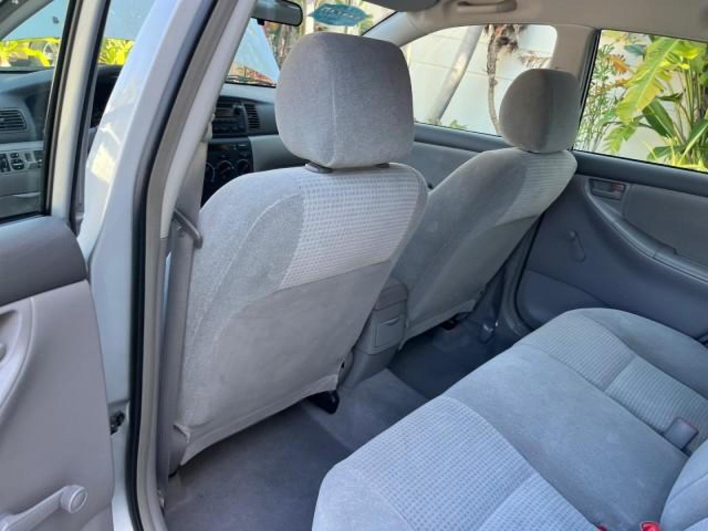 2005 Silver Streak Mica /Light Gray Toyota Corolla CE LOW MILES 39,259 (1NXBR32E55Z) with an 1.8L DOHC SEFI 16-Valve 4-Cyl Aluminum Engine engine, Automatic transmission, located at 4701 North Dixie Hwy, Pompano Beach, FL, 33064, (954) 422-2889, 26.240938, -80.123474 - OUR WEBPAGE FLORIDACARS1.COM HAS OVER 100 PHOTOS AND FREE CARFAX LINK 2005 TOYOTA COROLLA CE ROAD READY 1.8L I4 VIN: 1NXBR32E55Z429221 FLORIDA OWNER SEDAN 4 DR LOW MILES 39,259 1.8L I4 F DOHC 16V 6 SERVICE RECORDS GASOLINE 38 MPG FRONT WHEEL DRIVE FWD Front Bucket Seats THIS IS ONE OF THE NICEST COR - Photo#37