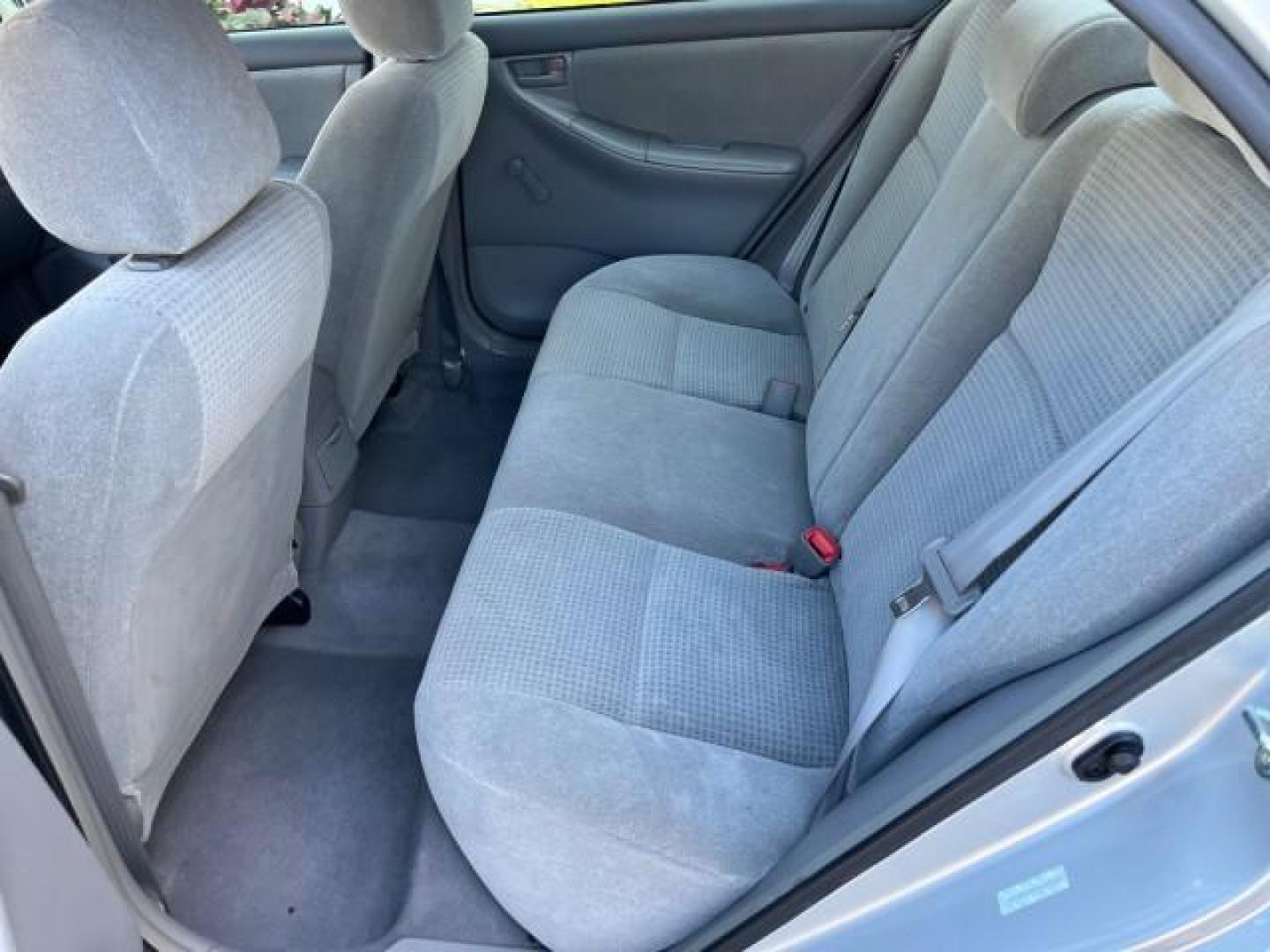 2005 Silver Streak Mica /Light Gray Toyota Corolla CE LOW MILES 39,259 (1NXBR32E55Z) with an 1.8L DOHC SEFI 16-Valve 4-Cyl Aluminum Engine engine, Automatic transmission, located at 4701 North Dixie Hwy, Pompano Beach, FL, 33064, (954) 422-2889, 26.240938, -80.123474 - OUR WEBPAGE FLORIDACARS1.COM HAS OVER 100 PHOTOS AND FREE CARFAX LINK 2005 TOYOTA COROLLA CE ROAD READY 1.8L I4 VIN: 1NXBR32E55Z429221 FLORIDA OWNER SEDAN 4 DR LOW MILES 39,259 1.8L I4 F DOHC 16V 6 SERVICE RECORDS GASOLINE 38 MPG FRONT WHEEL DRIVE FWD Front Bucket Seats THIS IS ONE OF THE NICEST COR - Photo#39