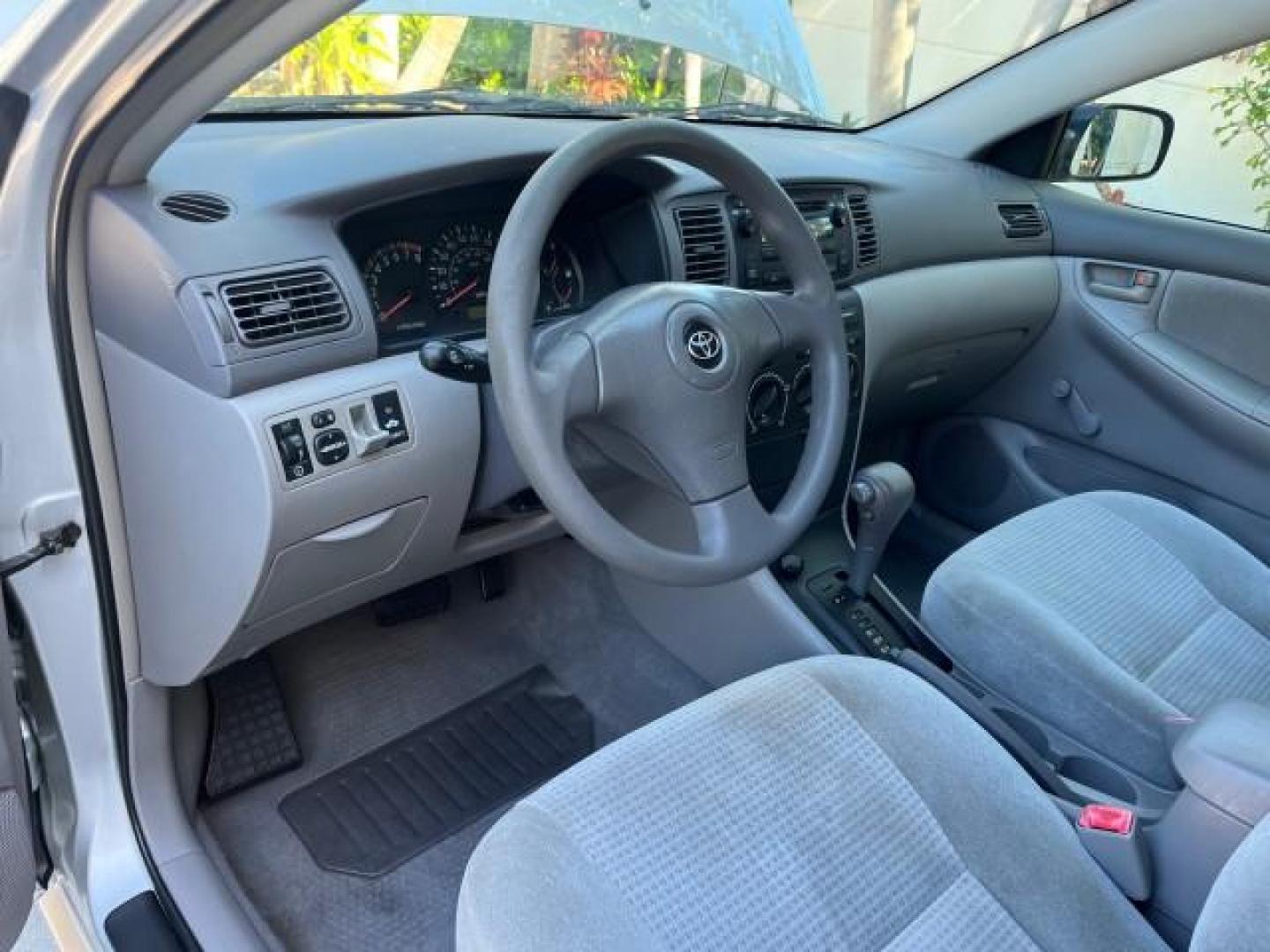 2005 Silver Streak Mica /Light Gray Toyota Corolla CE LOW MILES 39,259 (1NXBR32E55Z) with an 1.8L DOHC SEFI 16-Valve 4-Cyl Aluminum Engine engine, Automatic transmission, located at 4701 North Dixie Hwy, Pompano Beach, FL, 33064, (954) 422-2889, 26.240938, -80.123474 - OUR WEBPAGE FLORIDACARS1.COM HAS OVER 100 PHOTOS AND FREE CARFAX LINK 2005 TOYOTA COROLLA CE ROAD READY 1.8L I4 VIN: 1NXBR32E55Z429221 FLORIDA OWNER SEDAN 4 DR LOW MILES 39,259 1.8L I4 F DOHC 16V 6 SERVICE RECORDS GASOLINE 38 MPG FRONT WHEEL DRIVE FWD Front Bucket Seats THIS IS ONE OF THE NICEST COR - Photo#41