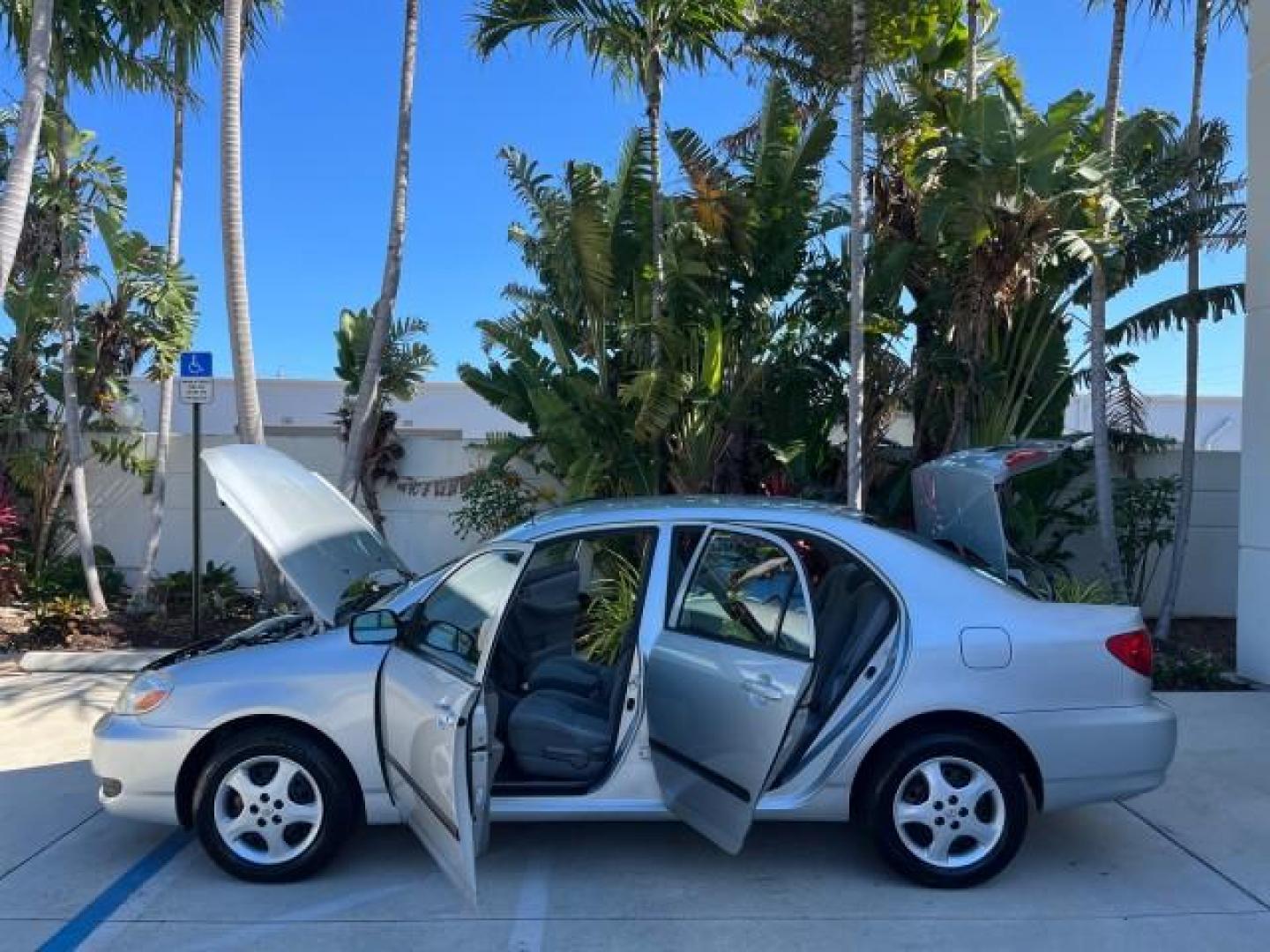 2005 Silver Streak Mica /Light Gray Toyota Corolla CE LOW MILES 39,259 (1NXBR32E55Z) with an 1.8L DOHC SEFI 16-Valve 4-Cyl Aluminum Engine engine, Automatic transmission, located at 4701 North Dixie Hwy, Pompano Beach, FL, 33064, (954) 422-2889, 26.240938, -80.123474 - OUR WEBPAGE FLORIDACARS1.COM HAS OVER 100 PHOTOS AND FREE CARFAX LINK 2005 TOYOTA COROLLA CE ROAD READY 1.8L I4 VIN: 1NXBR32E55Z429221 FLORIDA OWNER SEDAN 4 DR LOW MILES 39,259 1.8L I4 F DOHC 16V 6 SERVICE RECORDS GASOLINE 38 MPG FRONT WHEEL DRIVE FWD Front Bucket Seats THIS IS ONE OF THE NICEST COR - Photo#8