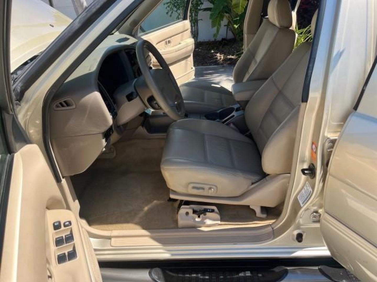 2001 Bronzed Gray Metallic /Beige Nissan Pathfinder SE LOW MILES 50,811 (JN8DR07X91W) with an 3.5L DOHC SMPI V6 Engine engine, Automatic transmission, located at 4701 North Dixie Hwy, Pompano Beach, FL, 33064, (954) 422-2889, 26.240938, -80.123474 - OUR WEBPAGE FLORIDACARS1.COM HAS OVER 100 PHOTOS AND FREE CARFAX LINK 2001 NISSAN PATHFINDER LE ROAD READY 3.5L V6 VIN: JN8DR07X91W511154 NO ACCIDENTS 4 DOOR WAGON/SPORT UTILITY NO RECALLS 3.5L V6 F DOHC POWER SEATS GASOLINE POWER MIRRORS REAR WHEEL DRIVE LOW MILES 50,811 ABS Brakes CD Audio Power L - Photo#10