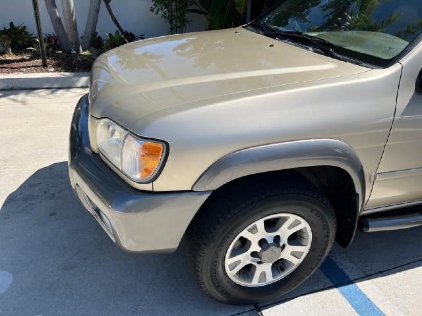 2001 Bronzed Gray Metallic /Beige Nissan Pathfinder SE LOW MILES 50,811 (JN8DR07X91W) with an 3.5L DOHC SMPI V6 Engine engine, Automatic transmission, located at 4701 North Dixie Hwy, Pompano Beach, FL, 33064, (954) 422-2889, 26.240938, -80.123474 - OUR WEBPAGE FLORIDACARS1.COM HAS OVER 100 PHOTOS AND FREE CARFAX LINK 2001 NISSAN PATHFINDER LE ROAD READY 3.5L V6 VIN: JN8DR07X91W511154 NO ACCIDENTS 4 DOOR WAGON/SPORT UTILITY NO RECALLS 3.5L V6 F DOHC POWER SEATS GASOLINE POWER MIRRORS REAR WHEEL DRIVE LOW MILES 50,811 ABS Brakes CD Audio Power L - Photo#88