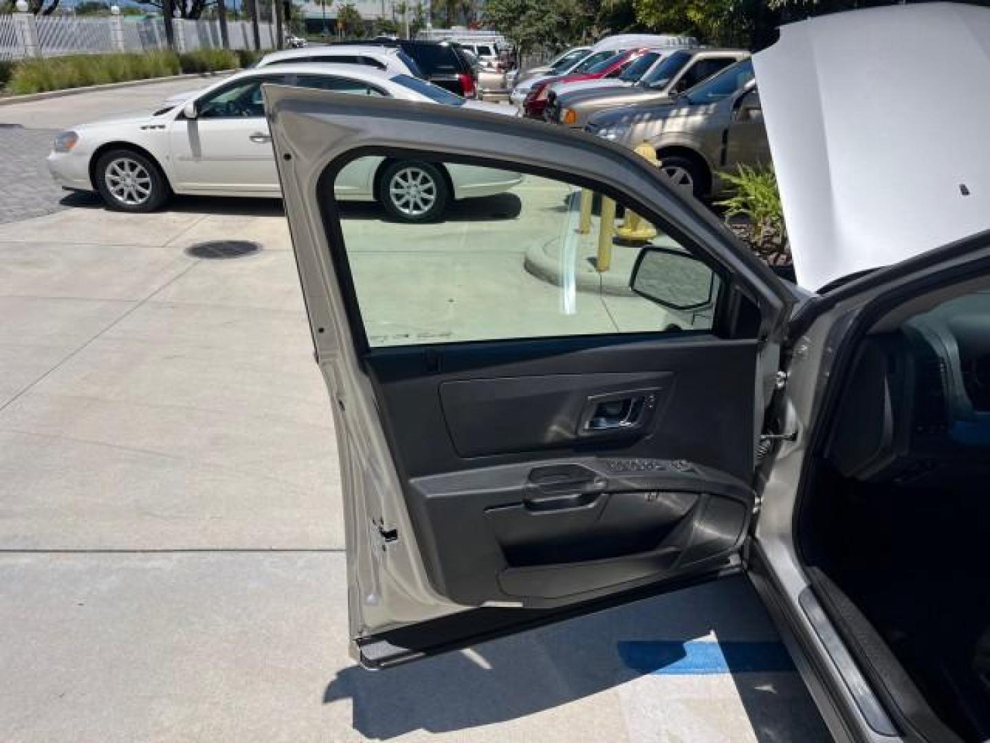 2006 Silver Smoke /Ebony Cadillac SRX LOW MILES 77,182 (1GYEE637160) with an 3.6L V6 VVT Engine engine, Automatic transmission, located at 4701 North Dixie Hwy, Pompano Beach, FL, 33064, (954) 422-2889, 26.240938, -80.123474 - OUR WEBPAGE FLORIDACARS1.COM HAS OVER 100 PHOTOS AND FREE CARFAX LINK 2006 CADILLAC SRX POWER LIFTGATE NEW $41,995 ROAD READY VIN: 1GYEE637160154304 NO RECALLS FLORIDA OWNER 4 DOOR WAGON/SPORT UTILITY 26 SERVICE RECORDS 3.6L V6 F PARK SENSORS POWER LEATHER SEATS 3 ROW GASOLINE LOW MILES 71,182 PANOR - Photo#9