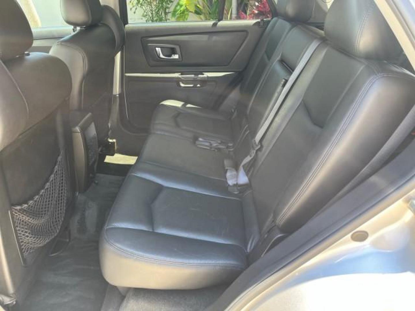 2006 Silver Smoke /Ebony Cadillac SRX LOW MILES 77,182 (1GYEE637160) with an 3.6L V6 VVT Engine engine, Automatic transmission, located at 4701 North Dixie Hwy, Pompano Beach, FL, 33064, (954) 422-2889, 26.240938, -80.123474 - OUR WEBPAGE FLORIDACARS1.COM HAS OVER 100 PHOTOS AND FREE CARFAX LINK 2006 CADILLAC SRX POWER LIFTGATE NEW $41,995 ROAD READY VIN: 1GYEE637160154304 NO RECALLS FLORIDA OWNER 4 DOOR WAGON/SPORT UTILITY 26 SERVICE RECORDS 3.6L V6 F PARK SENSORS POWER LEATHER SEATS 3 ROW GASOLINE LOW MILES 71,182 PANOR - Photo#40