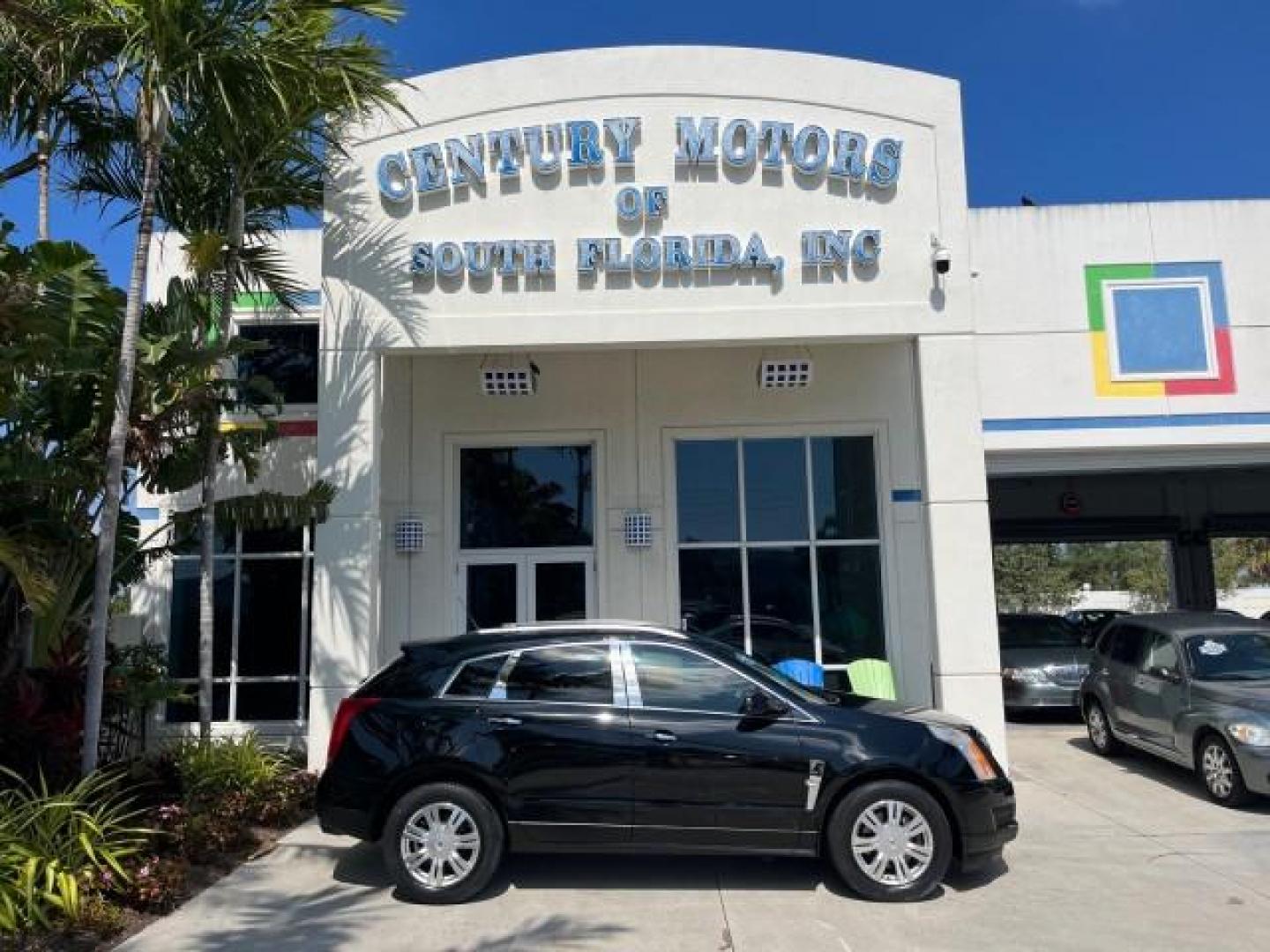 2011 Black Raven /Titanium w/Ebony accents Cadillac SRX Luxury Collection LOW MILES 65,496 (3GYFNAEY1BS) with an 3.0L VVT DOHC V6 SIDI Engine engine, Automatic transmission, located at 4701 North Dixie Hwy, Pompano Beach, FL, 33064, (954) 422-2889, 26.240938, -80.123474 - OUR WEBPAGE FLORIDACARS1.COM HAS OVER 100 PHOTOS AND FREE CARFAX LINK 2011 CADILLAC SRX LUXURY COLLECTION NEW $39,565 ROAD READY VIN: 3GYFNAEY1BS674910 NO ACCIDENTS NO RECALLS 4 DOOR WAGON/SPORT UTILITY FLORIDA OWNER 3.OL V6 3.0L V6 F DOHC 24V LOW MILES 65,496 GASOLINE BACK UP CAMERA/SENSORS FRONT W - Photo#0