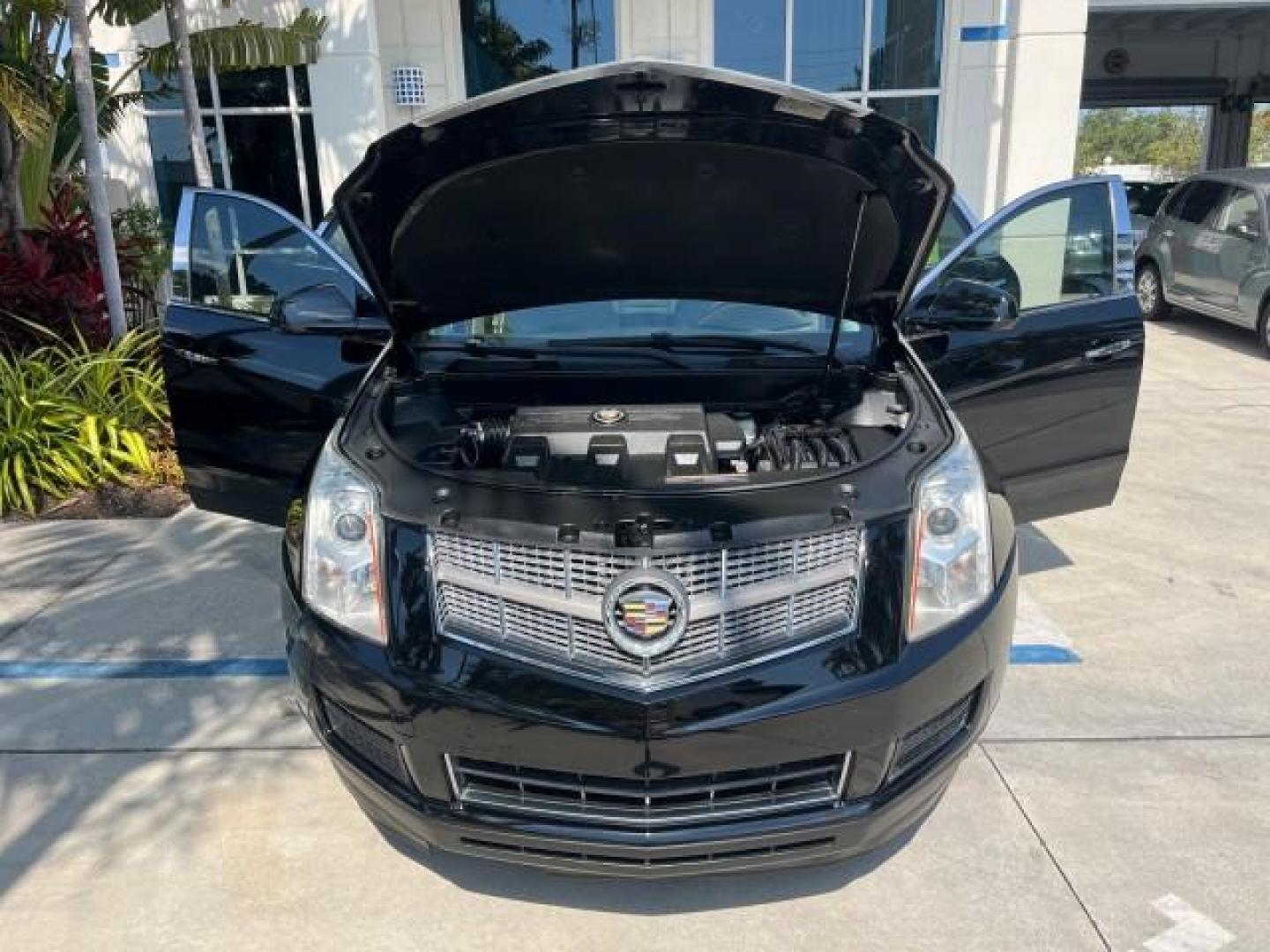 2011 Black Raven /Titanium w/Ebony accents Cadillac SRX Luxury Collection LOW MILES 65,496 (3GYFNAEY1BS) with an 3.0L VVT DOHC V6 SIDI Engine engine, Automatic transmission, located at 4701 North Dixie Hwy, Pompano Beach, FL, 33064, (954) 422-2889, 26.240938, -80.123474 - OUR WEBPAGE FLORIDACARS1.COM HAS OVER 100 PHOTOS AND FREE CARFAX LINK 2011 CADILLAC SRX LUXURY COLLECTION NEW $39,565 ROAD READY VIN: 3GYFNAEY1BS674910 NO ACCIDENTS NO RECALLS 4 DOOR WAGON/SPORT UTILITY FLORIDA OWNER 3.OL V6 3.0L V6 F DOHC 24V LOW MILES 65,496 GASOLINE BACK UP CAMERA/SENSORS FRONT W - Photo#16