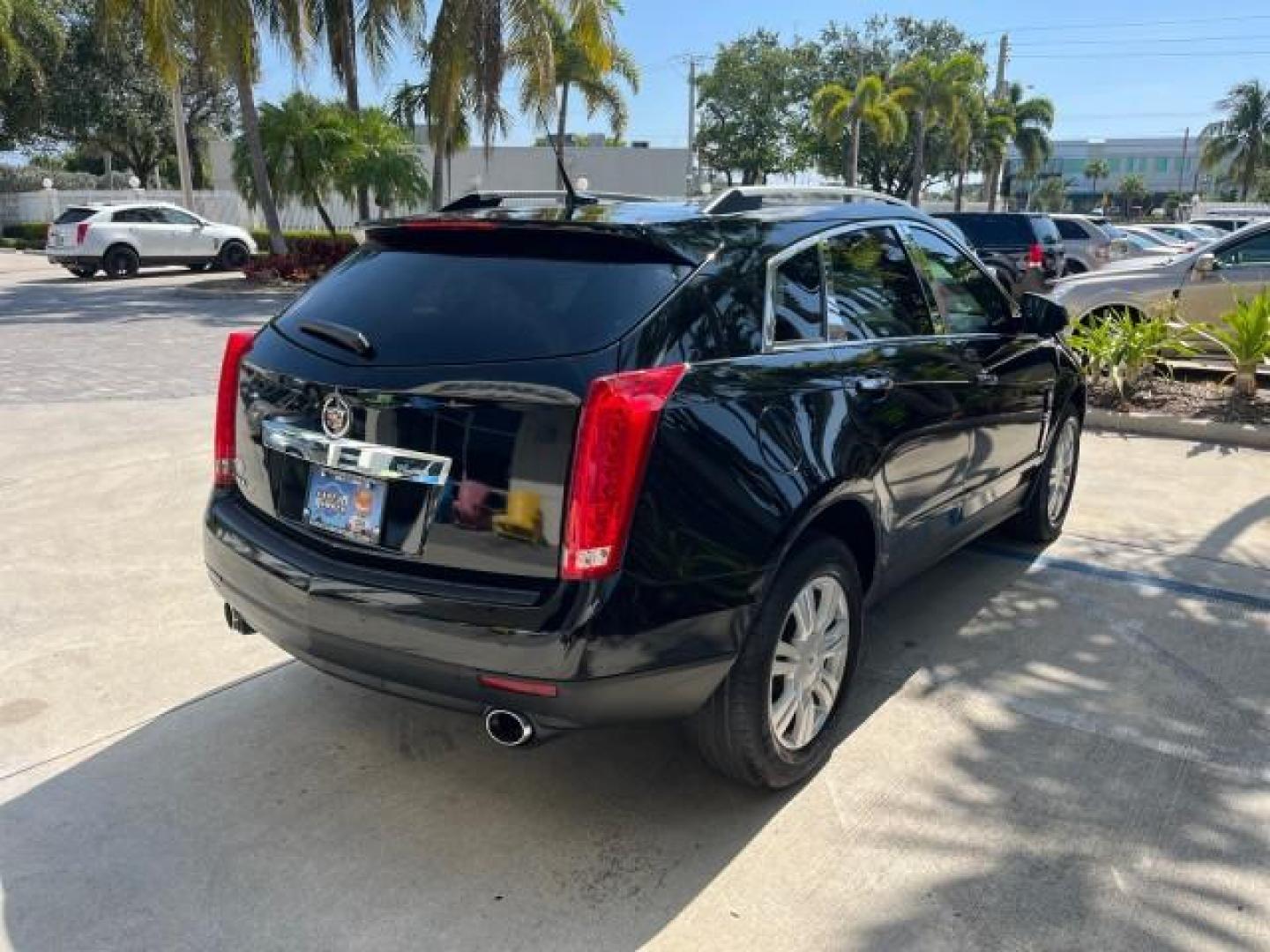 2011 Black Raven /Titanium w/Ebony accents Cadillac SRX Luxury Collection LOW MILES 65,496 (3GYFNAEY1BS) with an 3.0L VVT DOHC V6 SIDI Engine engine, Automatic transmission, located at 4701 North Dixie Hwy, Pompano Beach, FL, 33064, (954) 422-2889, 26.240938, -80.123474 - OUR WEBPAGE FLORIDACARS1.COM HAS OVER 100 PHOTOS AND FREE CARFAX LINK 2011 CADILLAC SRX LUXURY COLLECTION NEW $39,565 ROAD READY VIN: 3GYFNAEY1BS674910 NO ACCIDENTS NO RECALLS 4 DOOR WAGON/SPORT UTILITY FLORIDA OWNER 3.OL V6 3.0L V6 F DOHC 24V LOW MILES 65,496 GASOLINE BACK UP CAMERA/SENSORS FRONT W - Photo#7