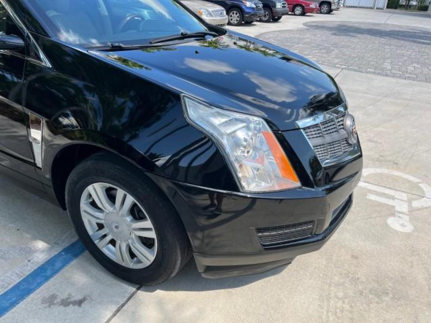 2011 Black Raven /Titanium w/Ebony accents Cadillac SRX Luxury Collection LOW MILES 65,496 (3GYFNAEY1BS) with an 3.0L VVT DOHC V6 SIDI Engine engine, Automatic transmission, located at 4701 North Dixie Hwy, Pompano Beach, FL, 33064, (954) 422-2889, 26.240938, -80.123474 - OUR WEBPAGE FLORIDACARS1.COM HAS OVER 100 PHOTOS AND FREE CARFAX LINK 2011 CADILLAC SRX LUXURY COLLECTION NEW $39,565 ROAD READY VIN: 3GYFNAEY1BS674910 NO ACCIDENTS NO RECALLS 4 DOOR WAGON/SPORT UTILITY FLORIDA OWNER 3.OL V6 3.0L V6 F DOHC 24V LOW MILES 65,496 GASOLINE BACK UP CAMERA/SENSORS FRONT W - Photo#86