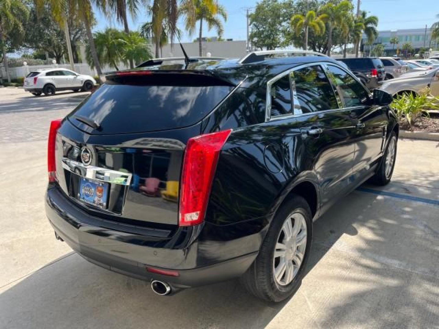 2011 Black Raven /Titanium w/Ebony accents Cadillac SRX Luxury Collection LOW MILES 65,496 (3GYFNAEY1BS) with an 3.0L VVT DOHC V6 SIDI Engine engine, Automatic transmission, located at 4701 North Dixie Hwy, Pompano Beach, FL, 33064, (954) 422-2889, 26.240938, -80.123474 - OUR WEBPAGE FLORIDACARS1.COM HAS OVER 100 PHOTOS AND FREE CARFAX LINK 2011 CADILLAC SRX LUXURY COLLECTION NEW $39,565 ROAD READY VIN: 3GYFNAEY1BS674910 NO ACCIDENTS NO RECALLS 4 DOOR WAGON/SPORT UTILITY FLORIDA OWNER 3.OL V6 3.0L V6 F DOHC 24V LOW MILES 65,496 GASOLINE BACK UP CAMERA/SENSORS FRONT W - Photo#95