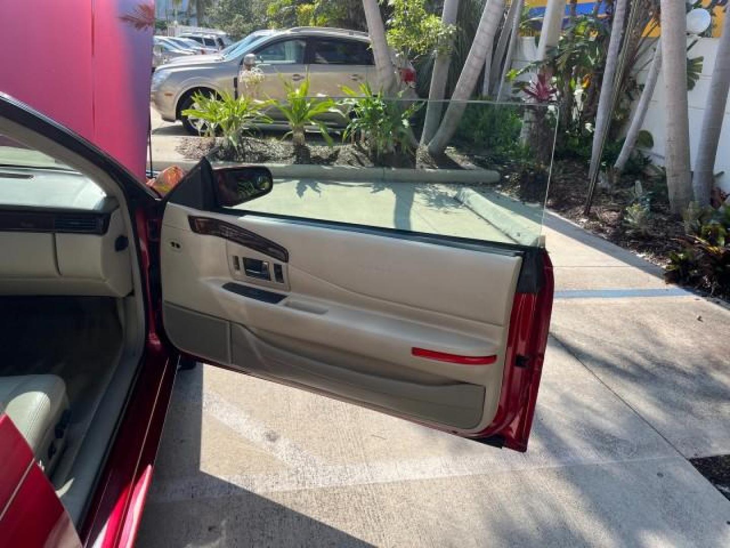 2001 Crimson Pearl /Oatmeal Cadillac Eldorado ESC LOW MILES 66,206 (1G6EL12Y21B) with an 4.6L SFI DOHC V8 275hp Northstar Engine engine, Automatic transmission, located at 4701 North Dixie Hwy, Pompano Beach, FL, 33064, (954) 422-2889, 26.240938, -80.123474 - OUR WEBPAGE FLORIDACARS1.COM HAS OVER 100 PHOTOS AND FREE CARFAX LINK 2001 CADILLAC ELDORADO ESC NEW $42,665 ROAD READY VIN: 1G6EL12Y21B104097 NO RECALLS 4.6L V8 COUPE FLORIDA OWNER 27 MPG 4.6L V8 F DOHC 32V POWER LEATHER SEATS GASOLINE 13 SERVICE RECORDS FRONT WHEEL DRIVE LOW MILES 66,206 Air Suspe - Photo#11