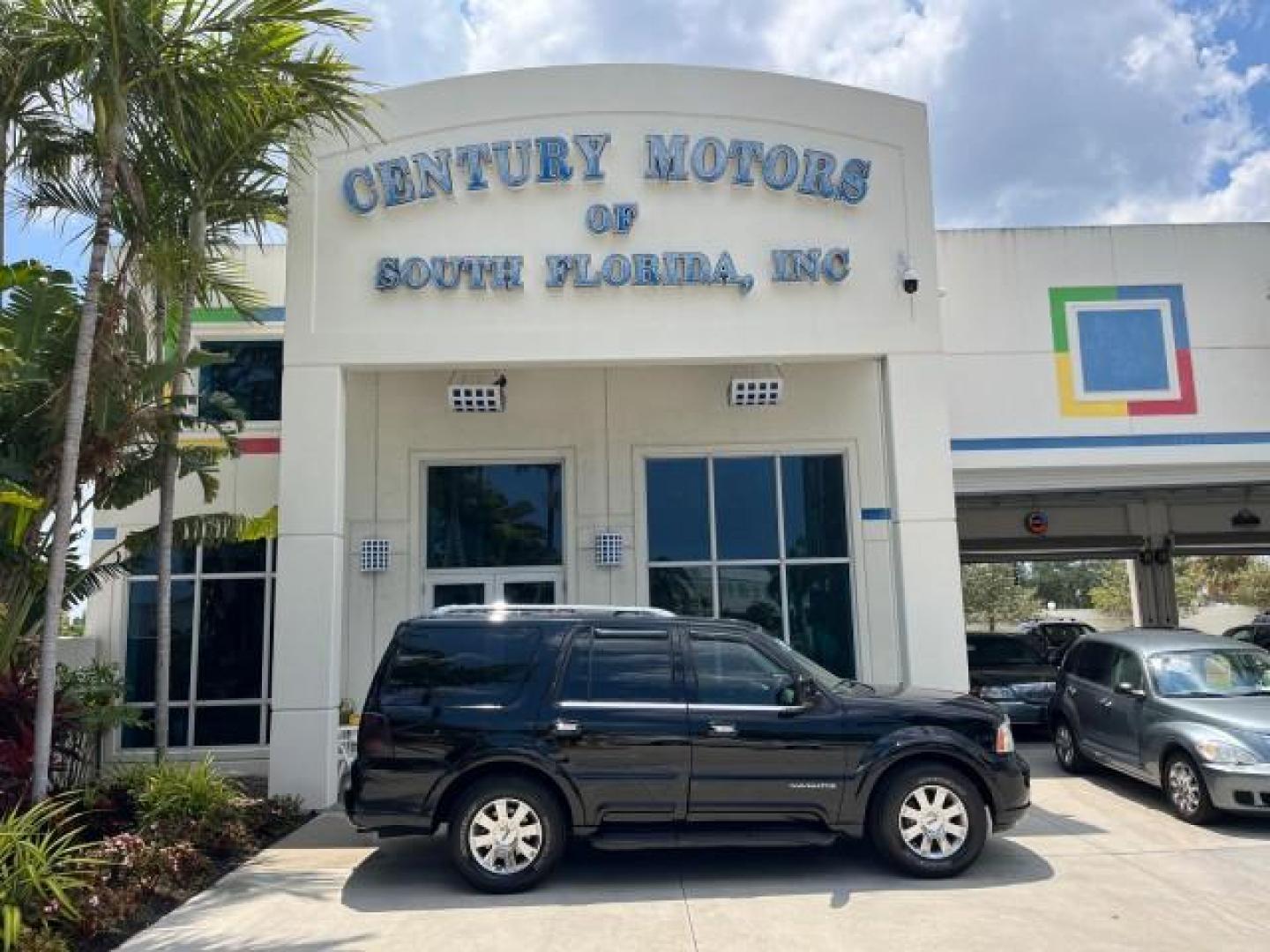 2003 Black /Light Parchment Lincoln Navigator AWD Luxury LOW MILES 74,590 (5LMFU28R43L) with an 5.4L DOHC 32-Valve V8 Intech Engine engine, Automatic transmission, located at 4701 North Dixie Hwy, Pompano Beach, FL, 33064, (954) 422-2889, 26.240938, -80.123474 - OUR WEBPAGE FLORIDACARS1.COM HAS OVER 100 PHOTOS AND FREE CARFAX LINK 2003 LINCOLN NAVIGATOR LUXURY ROAD READY 5.4L V8 VIN: 5LMFU28R43LJ04497 NO RECALLS AWD 4 DOOR WAGON/SPORT UTILITY POWER LEATHER SEATS 5.4L V8 F DOHC LOW MILES 74,590 GASOLINE 3 ROW SEATS 32 SERVICE RECORDS ALL WHEEL DRIVE POWER SU - Photo#0