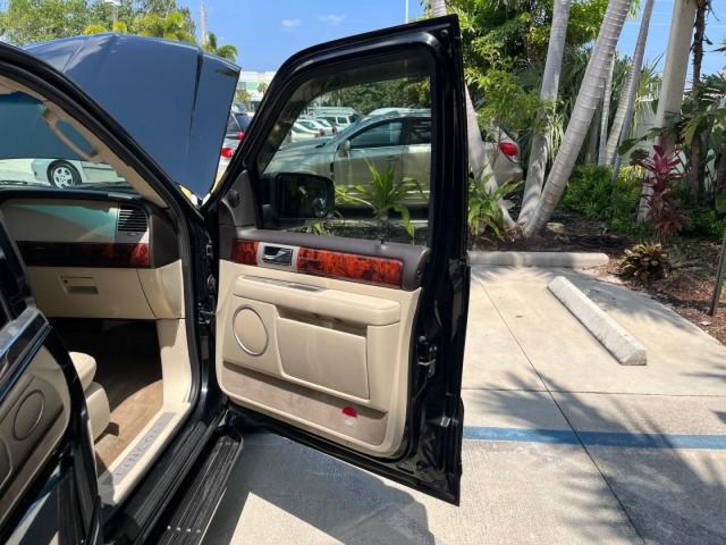 2003 Black /Light Parchment Lincoln Navigator AWD Luxury LOW MILES 74,590 (5LMFU28R43L) with an 5.4L DOHC 32-Valve V8 Intech Engine engine, Automatic transmission, located at 4701 North Dixie Hwy, Pompano Beach, FL, 33064, (954) 422-2889, 26.240938, -80.123474 - OUR WEBPAGE FLORIDACARS1.COM HAS OVER 100 PHOTOS AND FREE CARFAX LINK 2003 LINCOLN NAVIGATOR LUXURY ROAD READY 5.4L V8 VIN: 5LMFU28R43LJ04497 NO RECALLS AWD 4 DOOR WAGON/SPORT UTILITY POWER LEATHER SEATS 5.4L V8 F DOHC LOW MILES 74,590 GASOLINE 3 ROW SEATS 32 SERVICE RECORDS ALL WHEEL DRIVE POWER SU - Photo#11