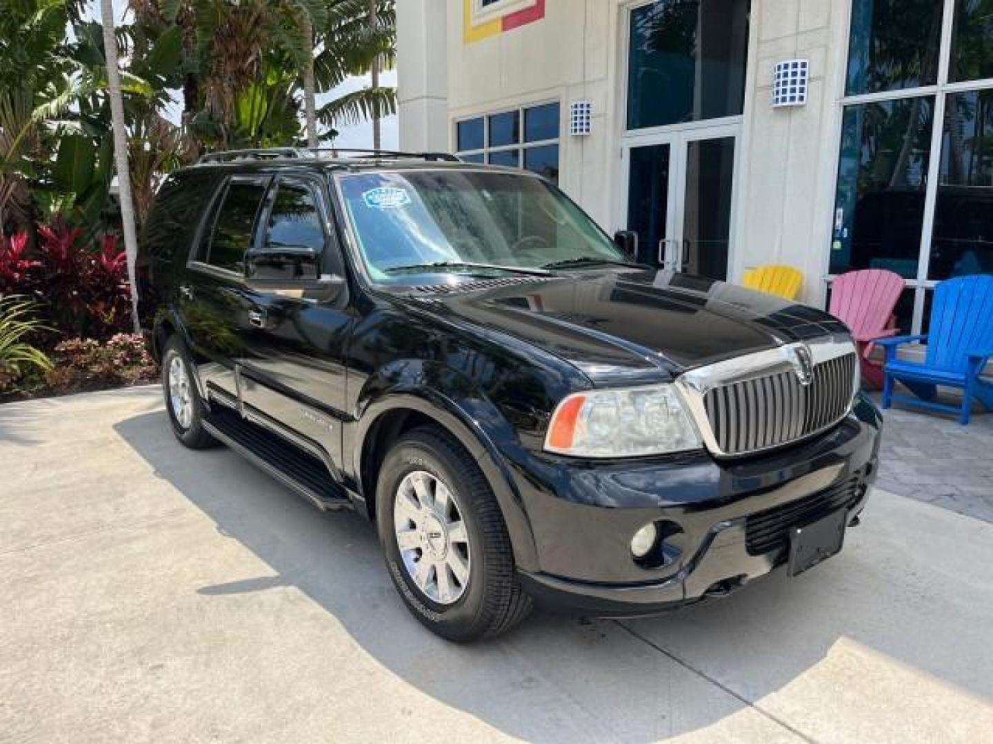 2003 Black /Light Parchment Lincoln Navigator AWD Luxury LOW MILES 74,590 (5LMFU28R43L) with an 5.4L DOHC 32-Valve V8 Intech Engine engine, Automatic transmission, located at 4701 North Dixie Hwy, Pompano Beach, FL, 33064, (954) 422-2889, 26.240938, -80.123474 - OUR WEBPAGE FLORIDACARS1.COM HAS OVER 100 PHOTOS AND FREE CARFAX LINK 2003 LINCOLN NAVIGATOR LUXURY ROAD READY 5.4L V8 VIN: 5LMFU28R43LJ04497 NO RECALLS AWD 4 DOOR WAGON/SPORT UTILITY POWER LEATHER SEATS 5.4L V8 F DOHC LOW MILES 74,590 GASOLINE 3 ROW SEATS 32 SERVICE RECORDS ALL WHEEL DRIVE POWER SU - Photo#1