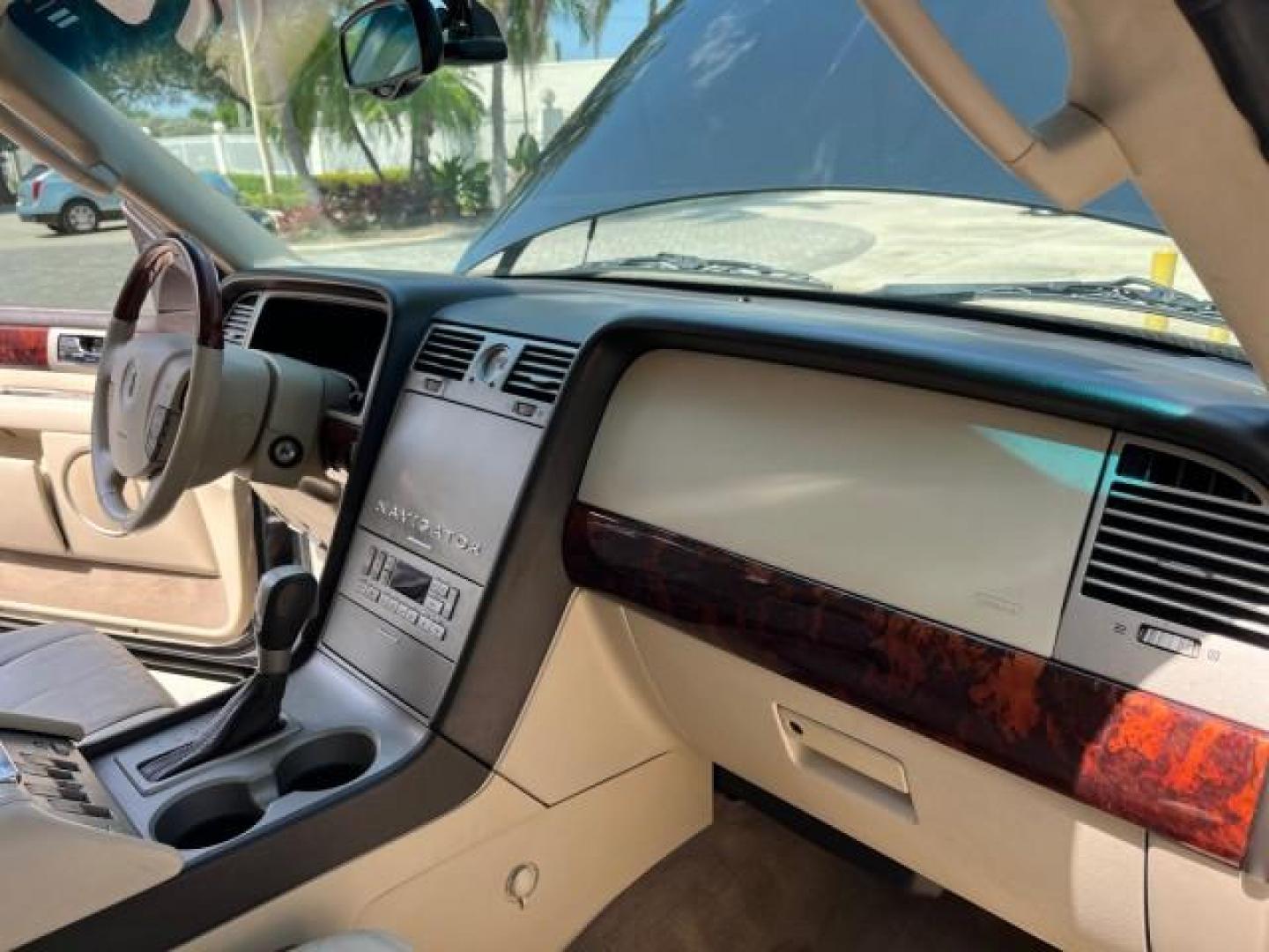 2003 Black /Light Parchment Lincoln Navigator AWD Luxury LOW MILES 74,590 (5LMFU28R43L) with an 5.4L DOHC 32-Valve V8 Intech Engine engine, Automatic transmission, located at 4701 North Dixie Hwy, Pompano Beach, FL, 33064, (954) 422-2889, 26.240938, -80.123474 - OUR WEBPAGE FLORIDACARS1.COM HAS OVER 100 PHOTOS AND FREE CARFAX LINK 2003 LINCOLN NAVIGATOR LUXURY ROAD READY 5.4L V8 VIN: 5LMFU28R43LJ04497 NO RECALLS AWD 4 DOOR WAGON/SPORT UTILITY POWER LEATHER SEATS 5.4L V8 F DOHC LOW MILES 74,590 GASOLINE 3 ROW SEATS 32 SERVICE RECORDS ALL WHEEL DRIVE POWER SU - Photo#26