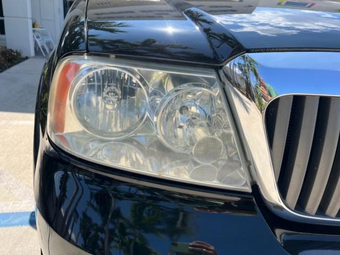 2003 Black /Light Parchment Lincoln Navigator AWD Luxury LOW MILES 74,590 (5LMFU28R43L) with an 5.4L DOHC 32-Valve V8 Intech Engine engine, Automatic transmission, located at 4701 North Dixie Hwy, Pompano Beach, FL, 33064, (954) 422-2889, 26.240938, -80.123474 - OUR WEBPAGE FLORIDACARS1.COM HAS OVER 100 PHOTOS AND FREE CARFAX LINK 2003 LINCOLN NAVIGATOR LUXURY ROAD READY 5.4L V8 VIN: 5LMFU28R43LJ04497 NO RECALLS AWD 4 DOOR WAGON/SPORT UTILITY POWER LEATHER SEATS 5.4L V8 F DOHC LOW MILES 74,590 GASOLINE 3 ROW SEATS 32 SERVICE RECORDS ALL WHEEL DRIVE POWER SU - Photo#68