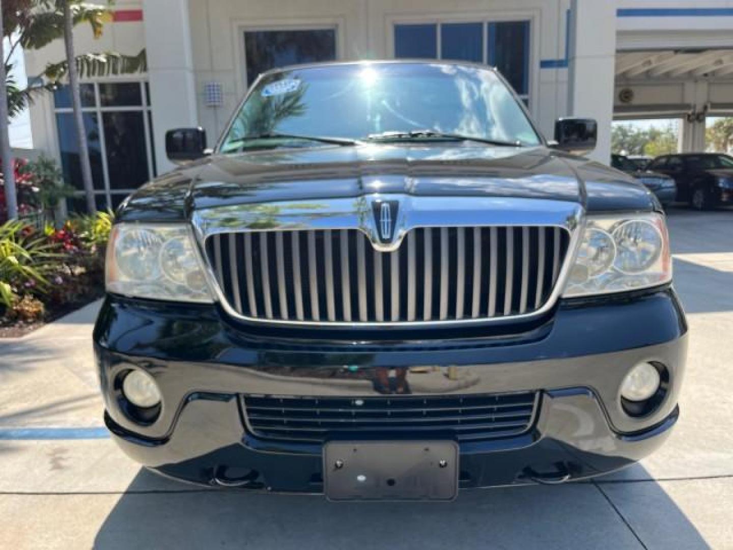 2003 Black /Light Parchment Lincoln Navigator AWD Luxury LOW MILES 74,590 (5LMFU28R43L) with an 5.4L DOHC 32-Valve V8 Intech Engine engine, Automatic transmission, located at 4701 North Dixie Hwy, Pompano Beach, FL, 33064, (954) 422-2889, 26.240938, -80.123474 - OUR WEBPAGE FLORIDACARS1.COM HAS OVER 100 PHOTOS AND FREE CARFAX LINK 2003 LINCOLN NAVIGATOR LUXURY ROAD READY 5.4L V8 VIN: 5LMFU28R43LJ04497 NO RECALLS AWD 4 DOOR WAGON/SPORT UTILITY POWER LEATHER SEATS 5.4L V8 F DOHC LOW MILES 74,590 GASOLINE 3 ROW SEATS 32 SERVICE RECORDS ALL WHEEL DRIVE POWER SU - Photo#72