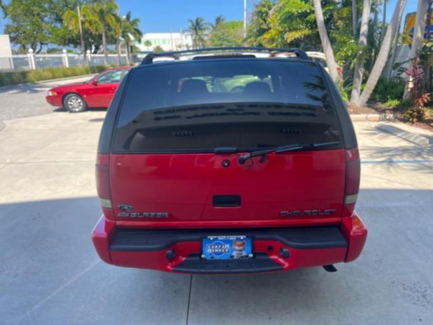 2000 Majestic Red Metallic /Gray/Graphite Chevrolet Blazer 4X4 TrailBlazer LOW MILES 78,578 (1GNDT13W6Y2) with an 4.3L Vortec 1000 SFI V6 Engine engine, Automatic transmission, located at 4701 North Dixie Hwy, Pompano Beach, FL, 33064, (954) 422-2889, 26.240938, -80.123474 - OUR WEBPAGE FLORIDACARS1.COM HAS OVER 100 PHOTOS AND FREE CARFAX LINK 2000 CHEVROLET BLAZER LS ROAD READY 4.3L V6 VIN: 1GNDT13W6Y2210222 NO ACCIDENTS 4 DOOR WAGON/SPORT UTILITY NO RECALLS 4X4 4.3L V6 F OHV 12V LOW MILES 78,578 GASOLINE 1 OWNER REAR WHEEL DRIVE W/ 4X4 11 SERVICE RECORDS 4WD Alloy Whe - Photo#6