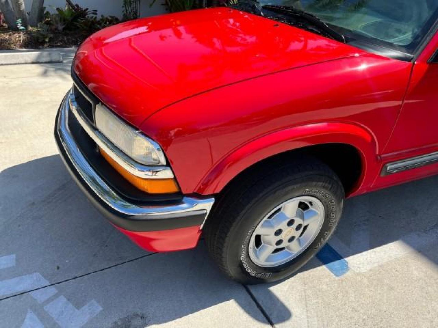 2000 Majestic Red Metallic /Gray/Graphite Chevrolet Blazer 4X4 TrailBlazer LOW MILES 78,578 (1GNDT13W6Y2) with an 4.3L Vortec 1000 SFI V6 Engine engine, Automatic transmission, located at 4701 North Dixie Hwy, Pompano Beach, FL, 33064, (954) 422-2889, 26.240938, -80.123474 - OUR WEBPAGE FLORIDACARS1.COM HAS OVER 100 PHOTOS AND FREE CARFAX LINK 2000 CHEVROLET BLAZER LS ROAD READY 4.3L V6 VIN: 1GNDT13W6Y2210222 NO ACCIDENTS 4 DOOR WAGON/SPORT UTILITY NO RECALLS 4X4 4.3L V6 F OHV 12V LOW MILES 78,578 GASOLINE 1 OWNER REAR WHEEL DRIVE W/ 4X4 11 SERVICE RECORDS 4WD Alloy Whe - Photo#74