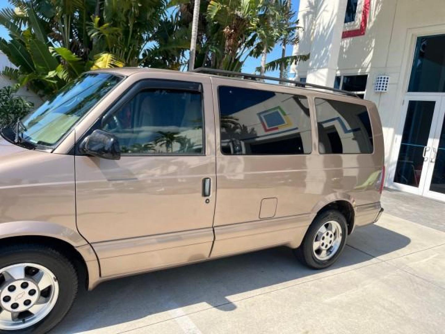 2003 Bronzemist Metallic /Medium Gray Chevrolet Astro Passenger 1 OWNER LOW MILES 79,048 (1GNDM19X83B) with an 4.3L Vortec 4300 V6 MFI Engine engine, Automatic transmission, located at 4701 North Dixie Hwy, Pompano Beach, FL, 33064, (954) 422-2889, 26.240938, -80.123474 - 2003 CHEVROLET ASTRO 8 PASSENGER SEATING ROAD READY 4.3L V6 VIN: 1GNDM19X83B119765 NO ACCIDENTS VAN NO RECALLS 4.3L V6 F OHV 12V 1 OWNER GASOLINE 3 ROW SEATS REAR WHEEL DRIVE LOW MILES 79,048 13 SERVICE RECORDS Approach Lights Cruise Control Front Bucket Seats Premium Sound Premium Sound System RWD - Photo#72